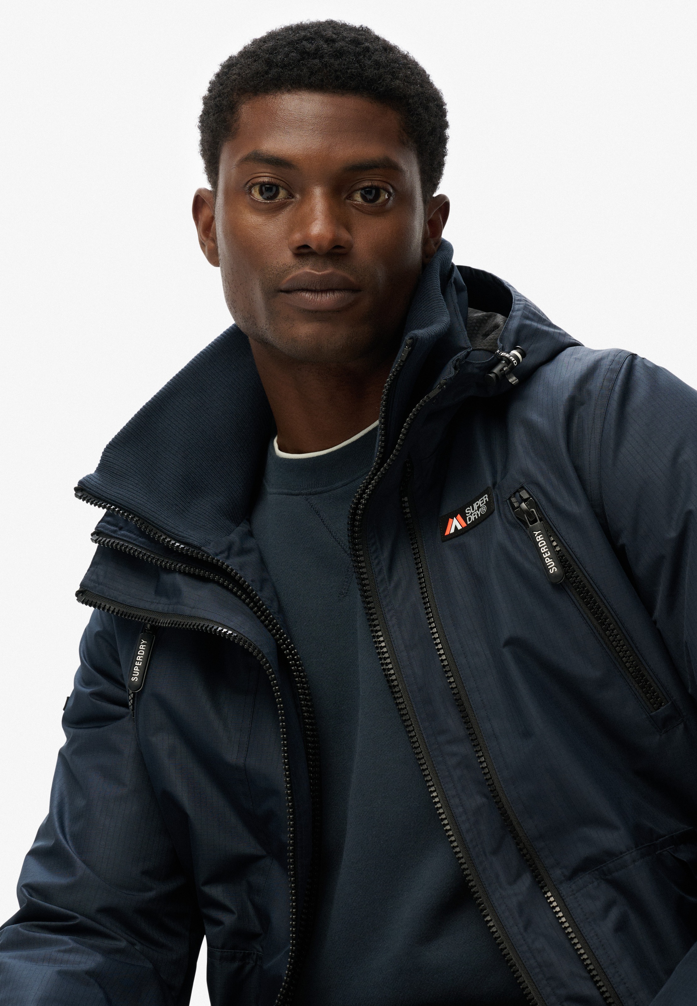 Superdry Outdoorjacke »HOODED MTN WINDBREAKER JACKET«, mit Kapuze