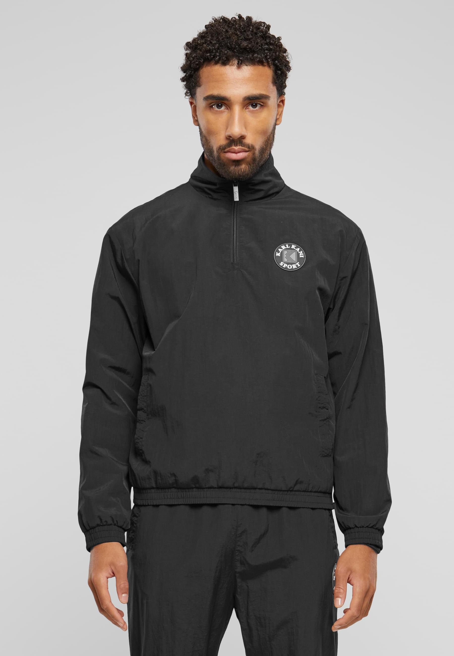 Karl Kani Allwetterjacke »Karl Kani Herren KM241-045-2 Karl Kani Og Track Troyer«, (1 St.), ohne Kapuze