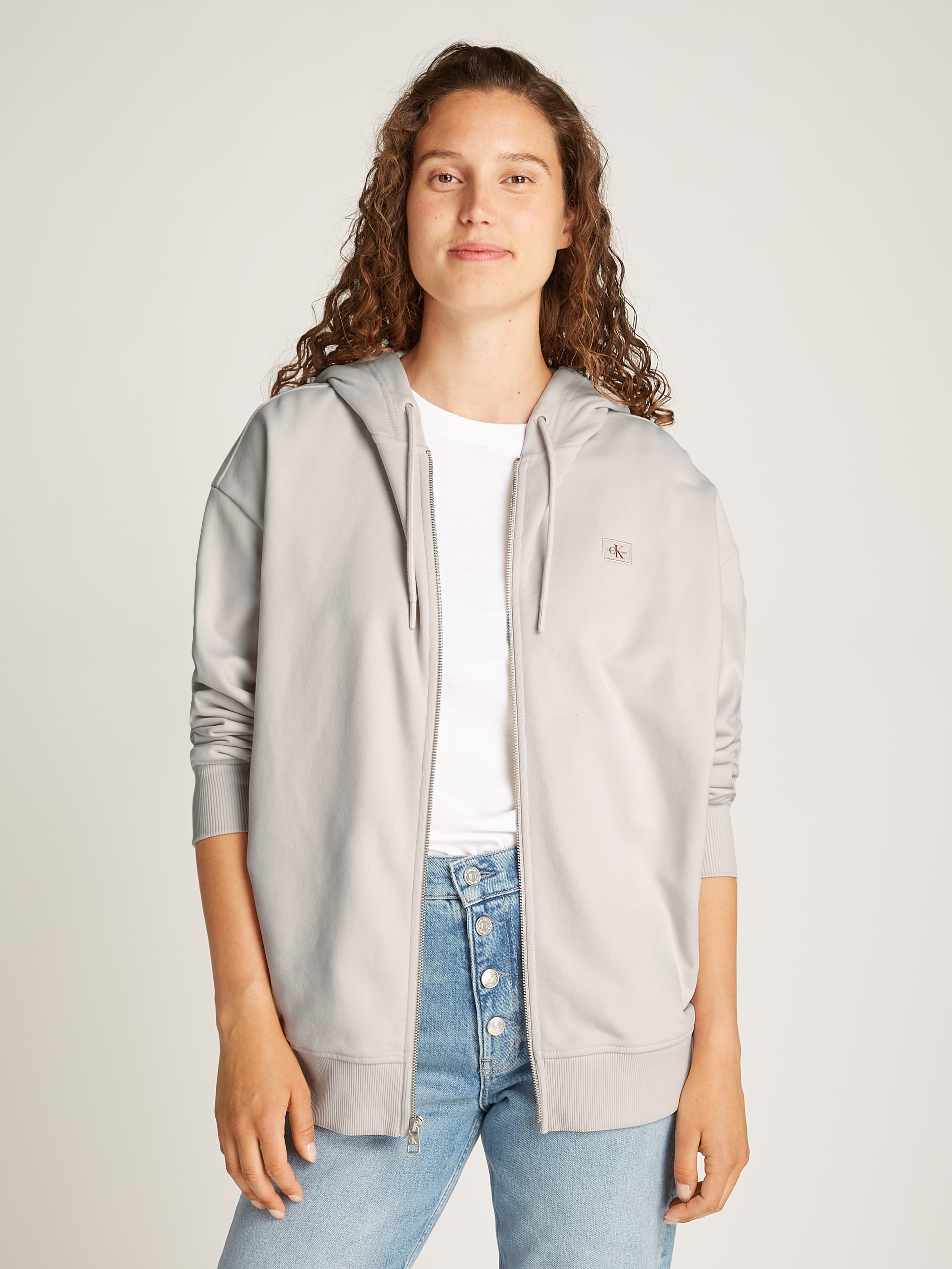 Calvin Klein Jeans Sweatjacke "WOVEN LABEL ZIP-THROUGH", mit Logo-Label günstig online kaufen