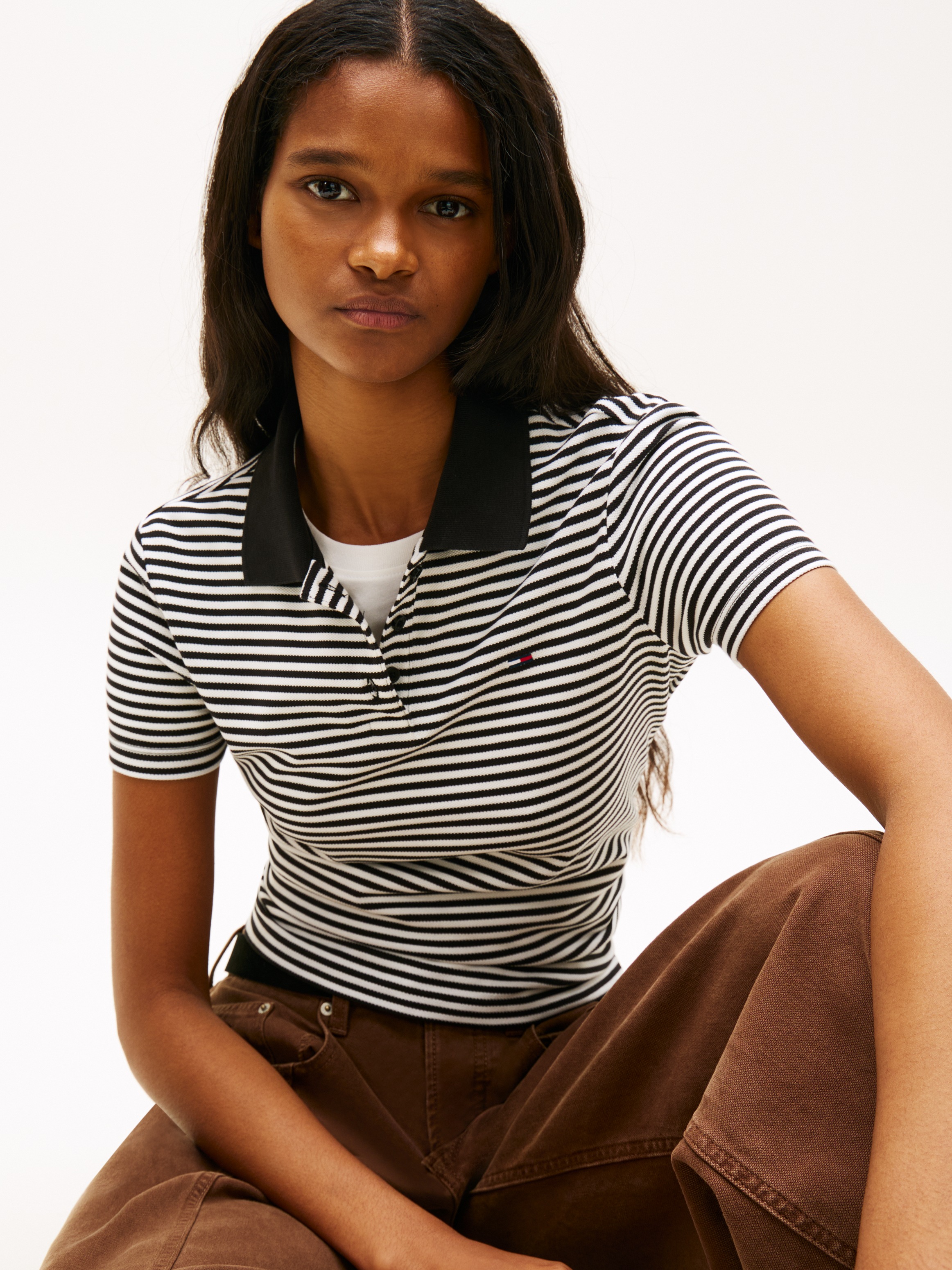 Tommy Jeans Poloshirt "TJW SLIM ESSENTIAL POLO SS" mit Logostickerei günstig online kaufen