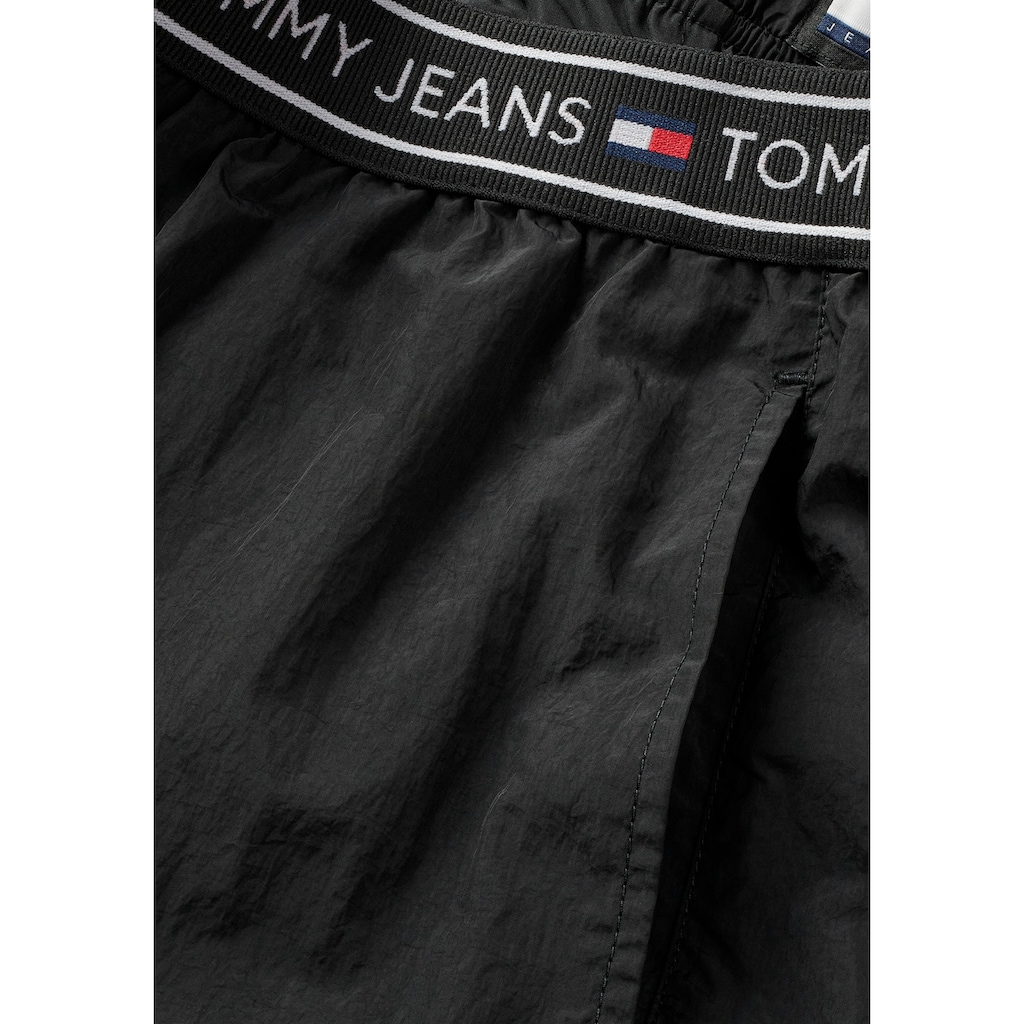 Tommy Jeans Webhose »TJW BAGGY TAPING TRACKPANT EXT«, mit Logoprägung