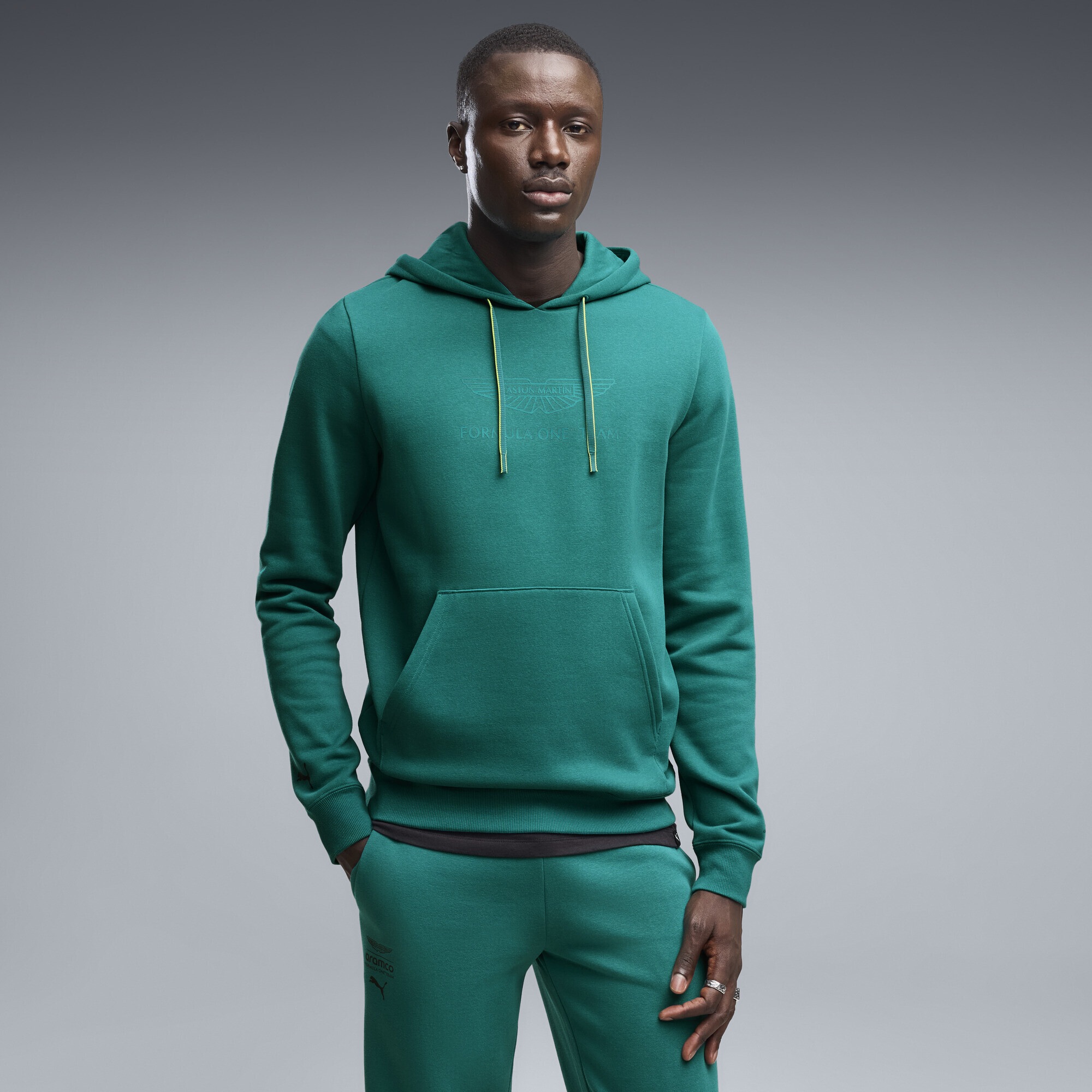PUMA Hoodie »PUMA x ASTON MARTIN ARAMCO F1® TEAM Essentials Hoodie Herren«
