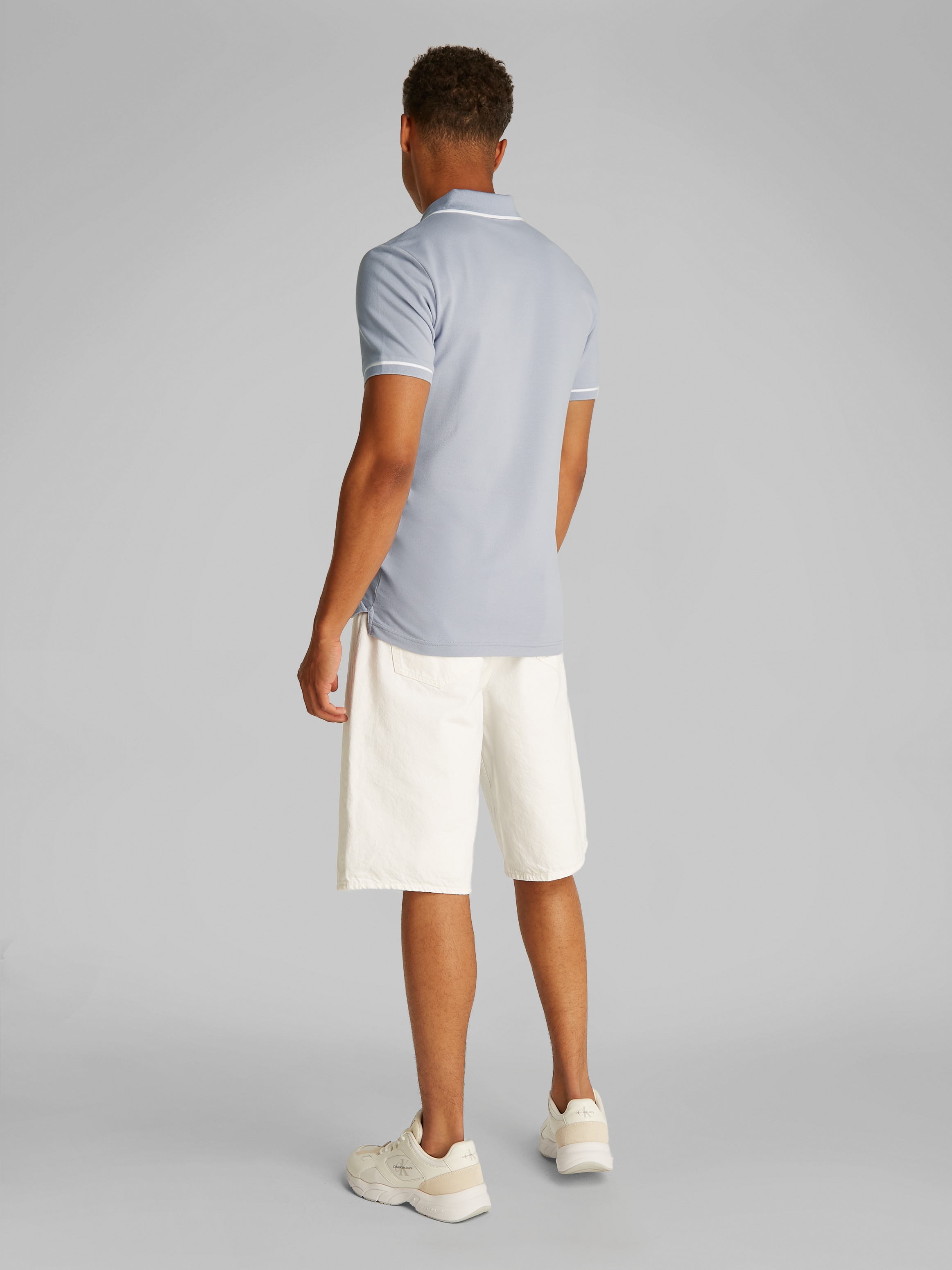 Calvin Klein Jeans Poloshirt »TIPPING SLIM POLO«, mit Streifendetail am Kragen