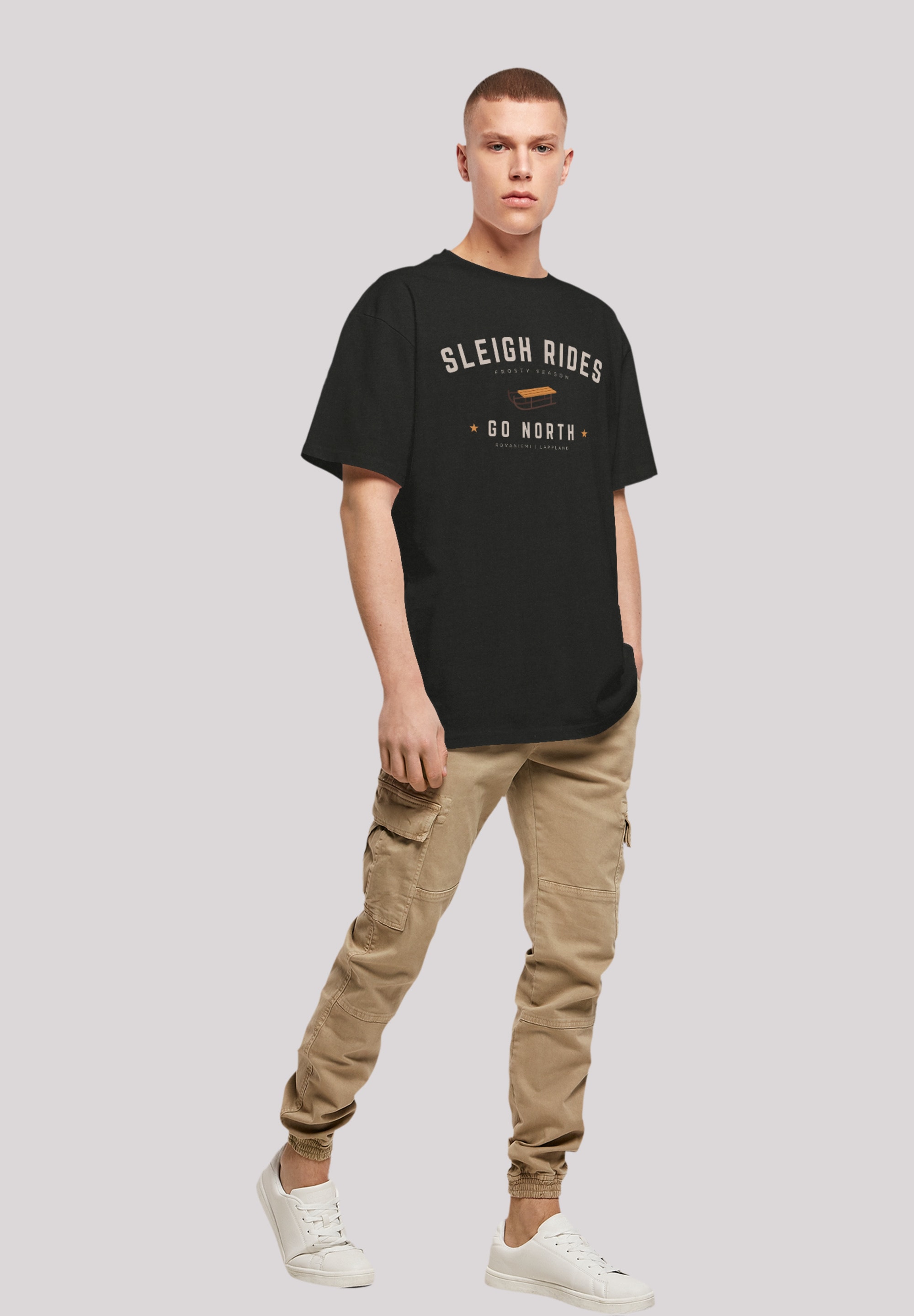 F4NT4STIC T-Shirt »Schlittenfahren Weihnachten Christmas«, Weihnachten, Geschenk, Logo