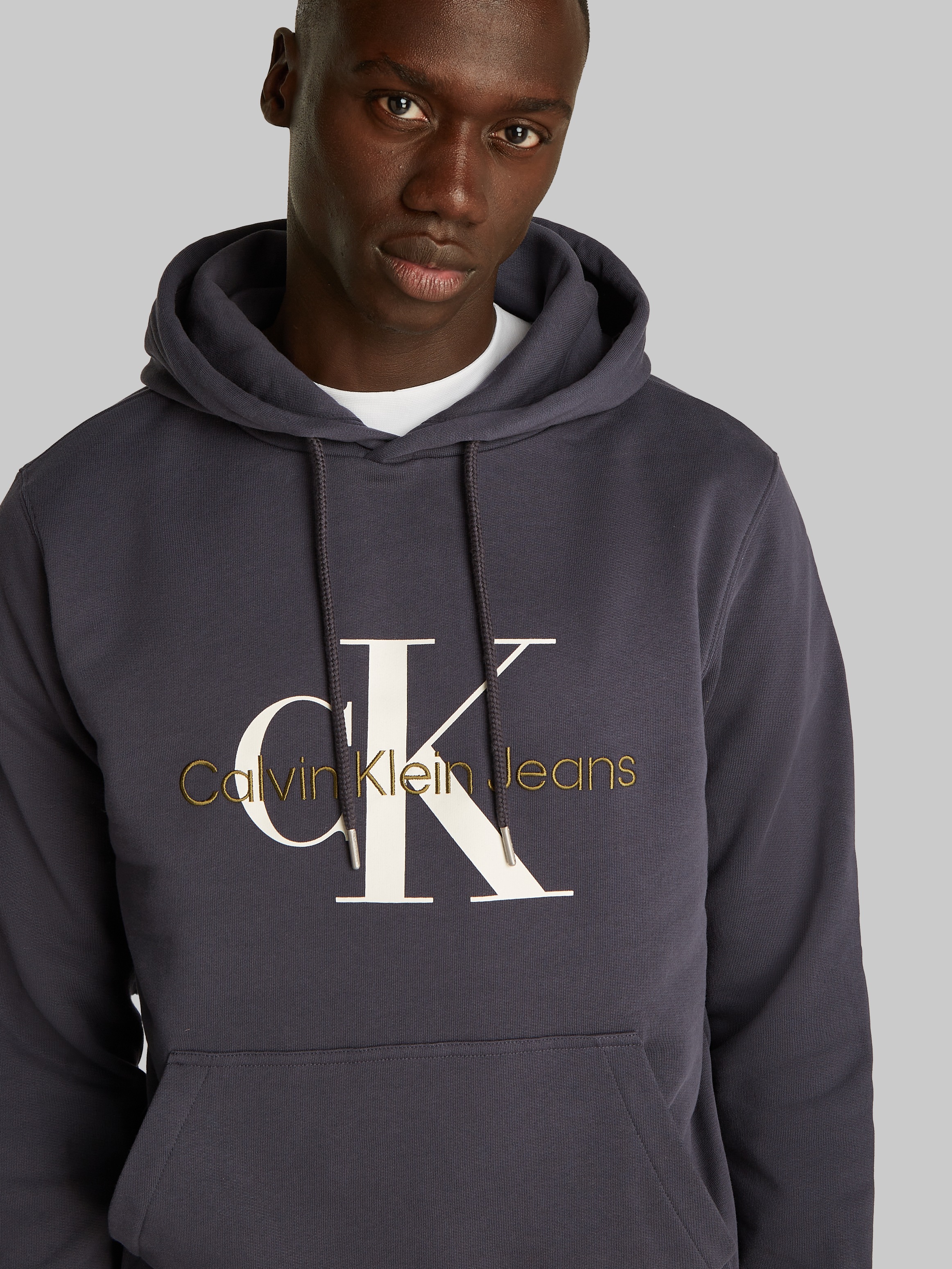 Calvin Klein Jeans Kapuzensweatshirt »SEASONAL MONOLOGO REGULAR HOODIE«, mit Logodruck und Stickerei