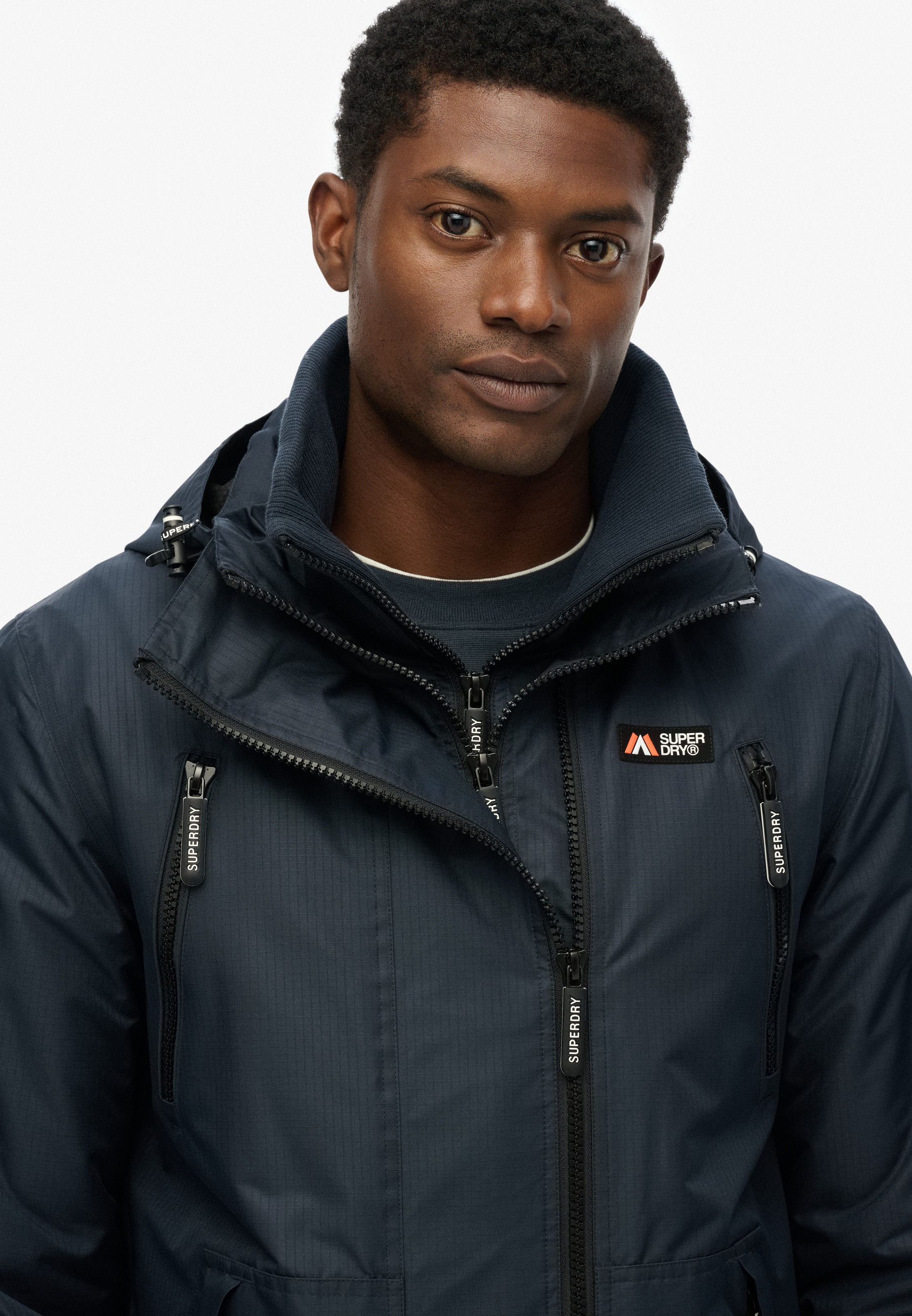Superdry Outdoorjacke »HOODED MTN WINDBREAKER JACKET«, mit Kapuze