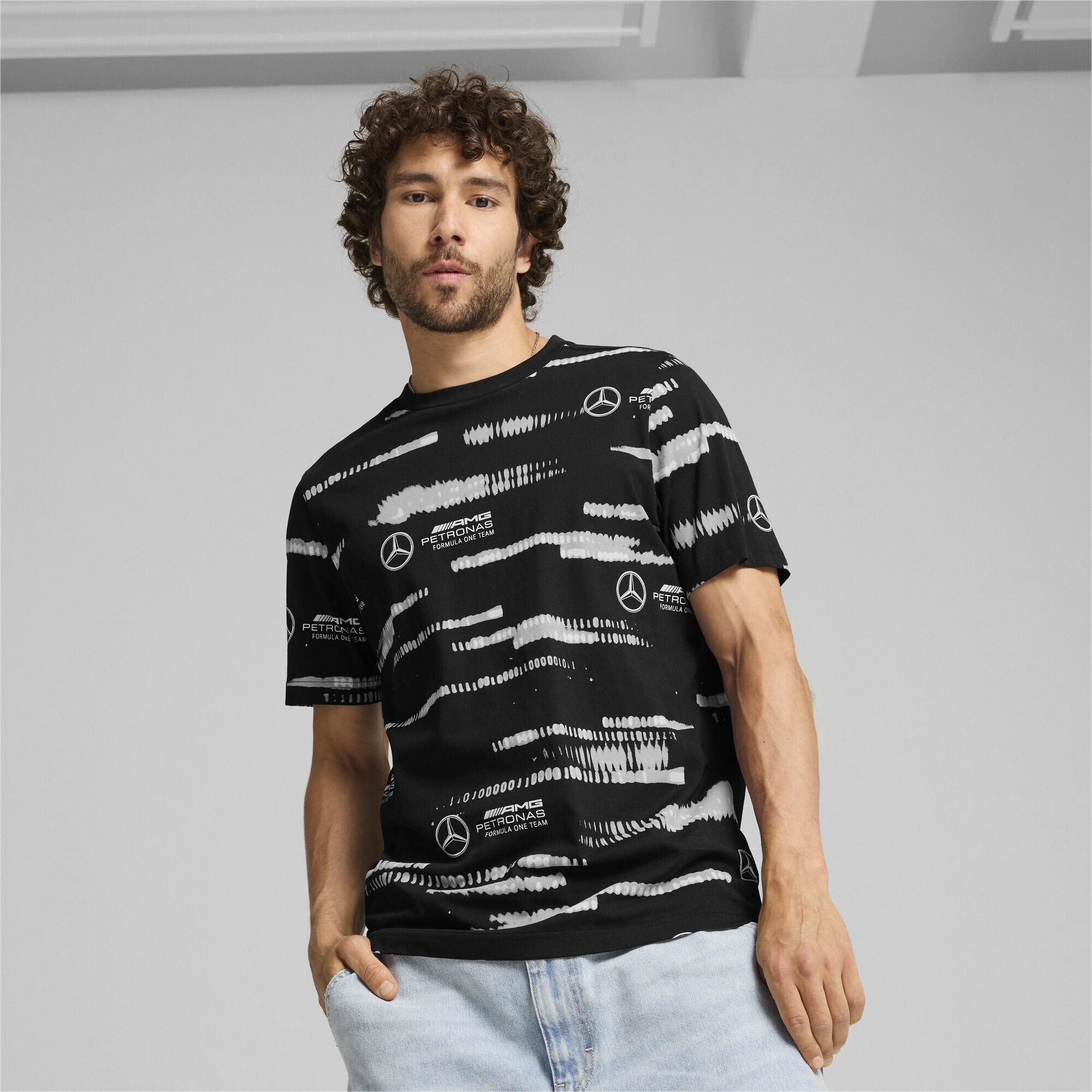 PUMA T-Shirt »Mercedes-AMG Petronas F1® Logo T-Shirt mit Allover-Print Herren«