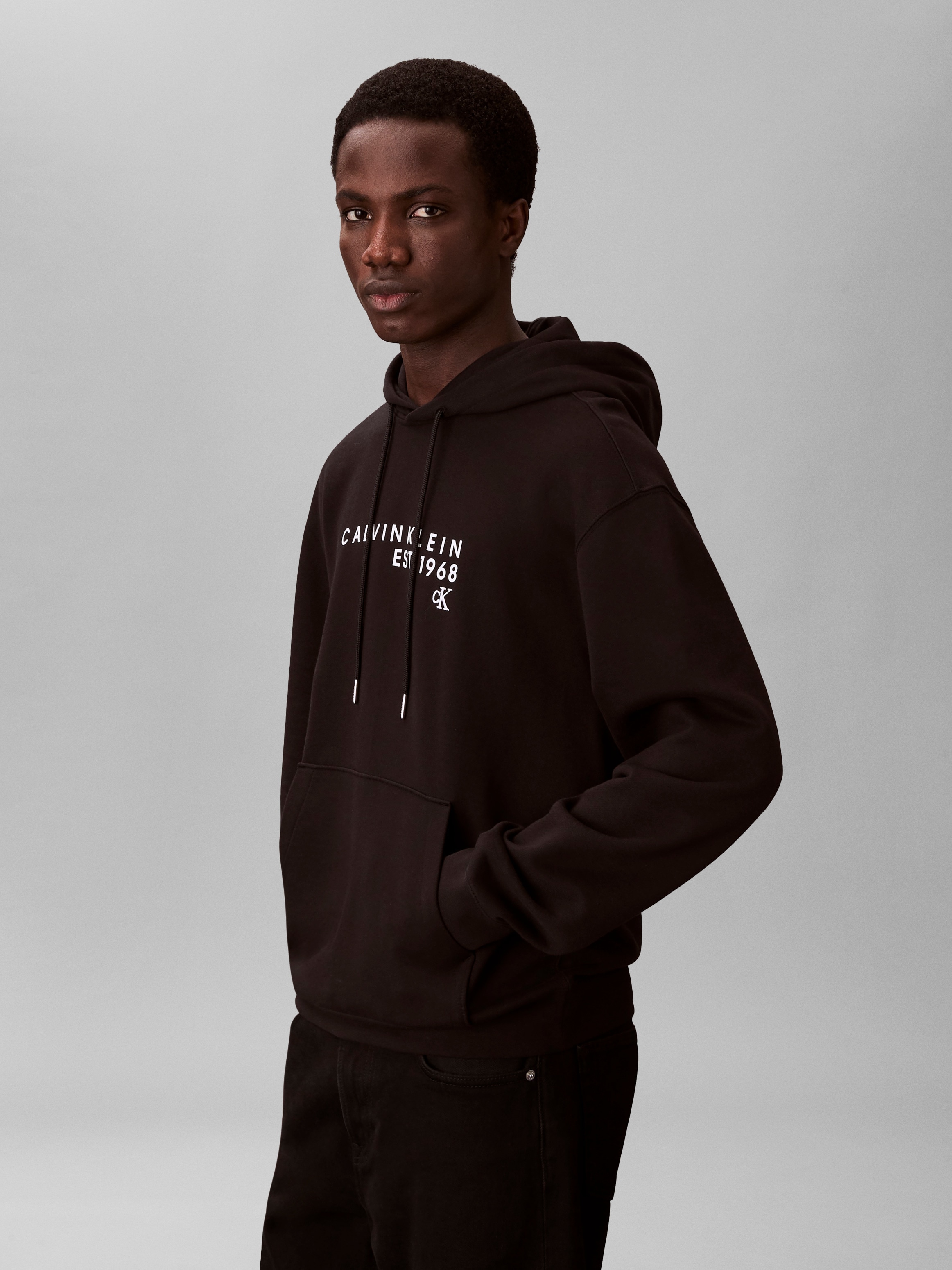 Calvin Klein Jeans Kapuzensweatshirt »CALVIN 1968 GRAPHIC«, Regular fit mit Kapuze mit Kordelzug
