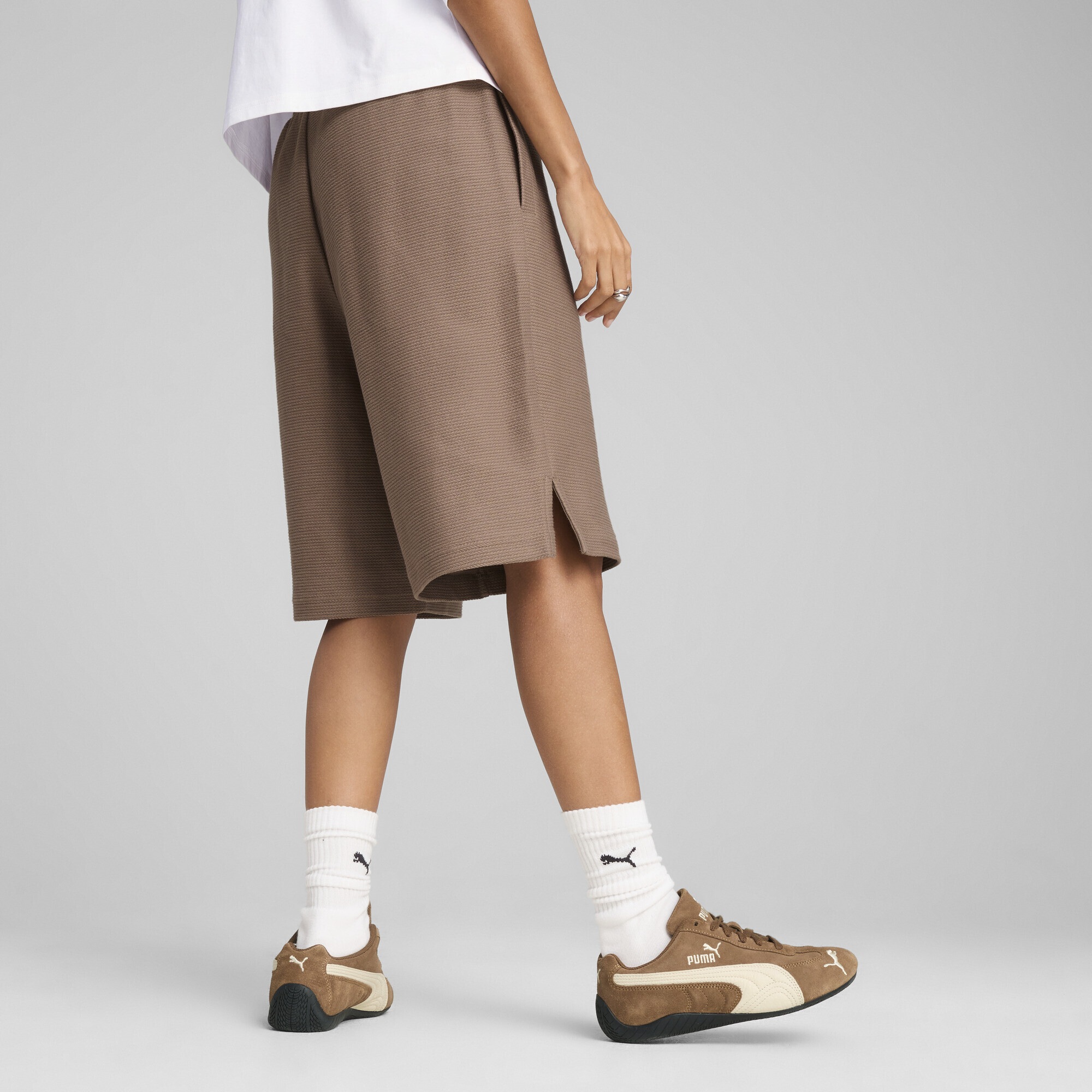 PUMA Sporthose »PREMIUM ESS Jacquard 11" Relaxed Lange Shorts Erwachsene«