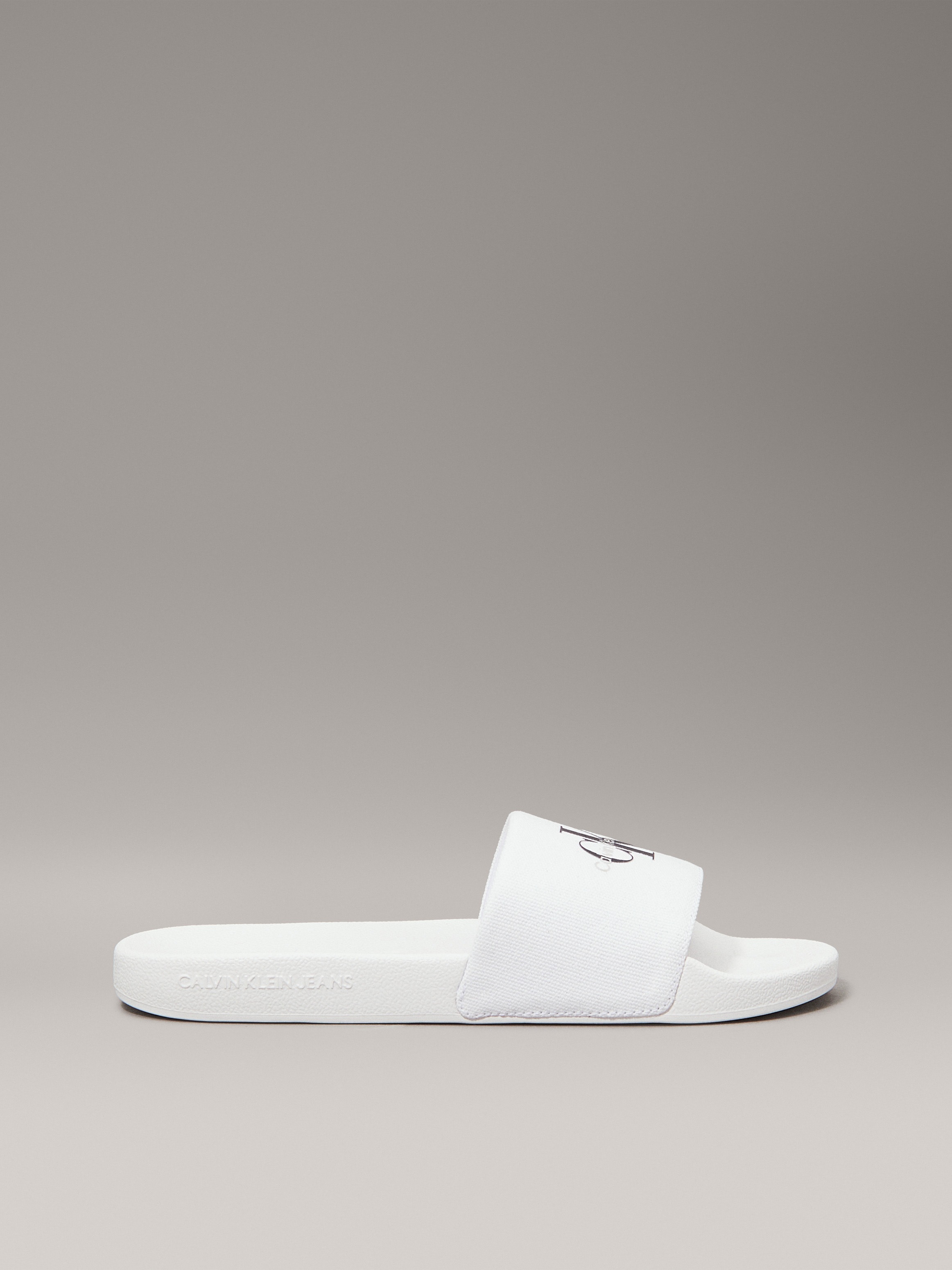 Calvin Klein Jeans Pantolette »SLIDE MONOGRAM WMNS«, Poolslides, Schlappen, Sommerpantolette, Strandschuh zum Schlupfen