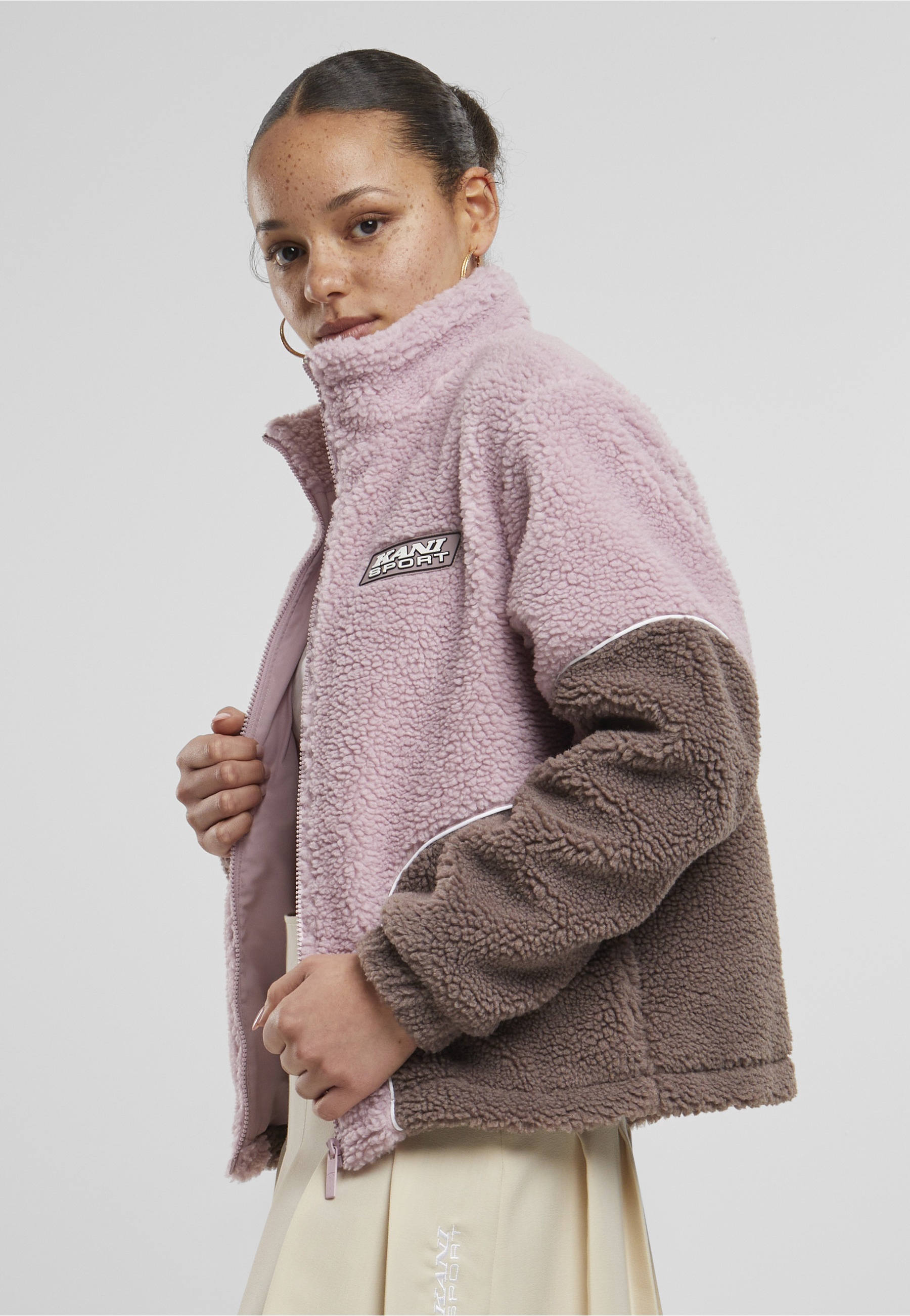 Karl Kani Trainingsjacke »Karl Kani Karl Kani Sport Patch Teddy Block Trackjacket« 1 Stk. tlg. ohne Kapuze