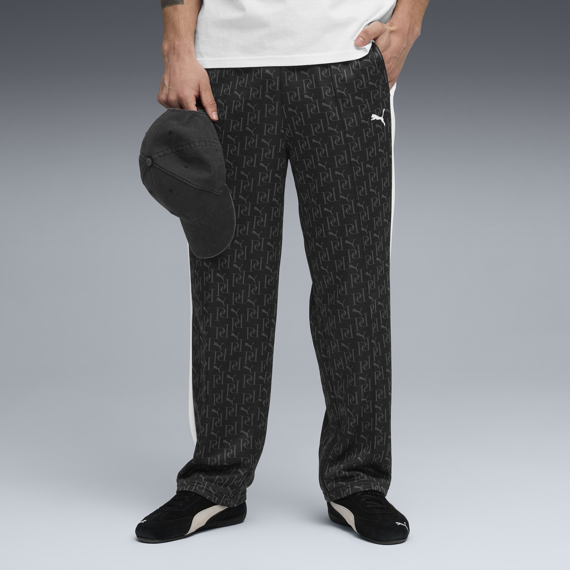 PUMA Sporthose »T7 Allover-Print Relaxed Trainingshose Herren«