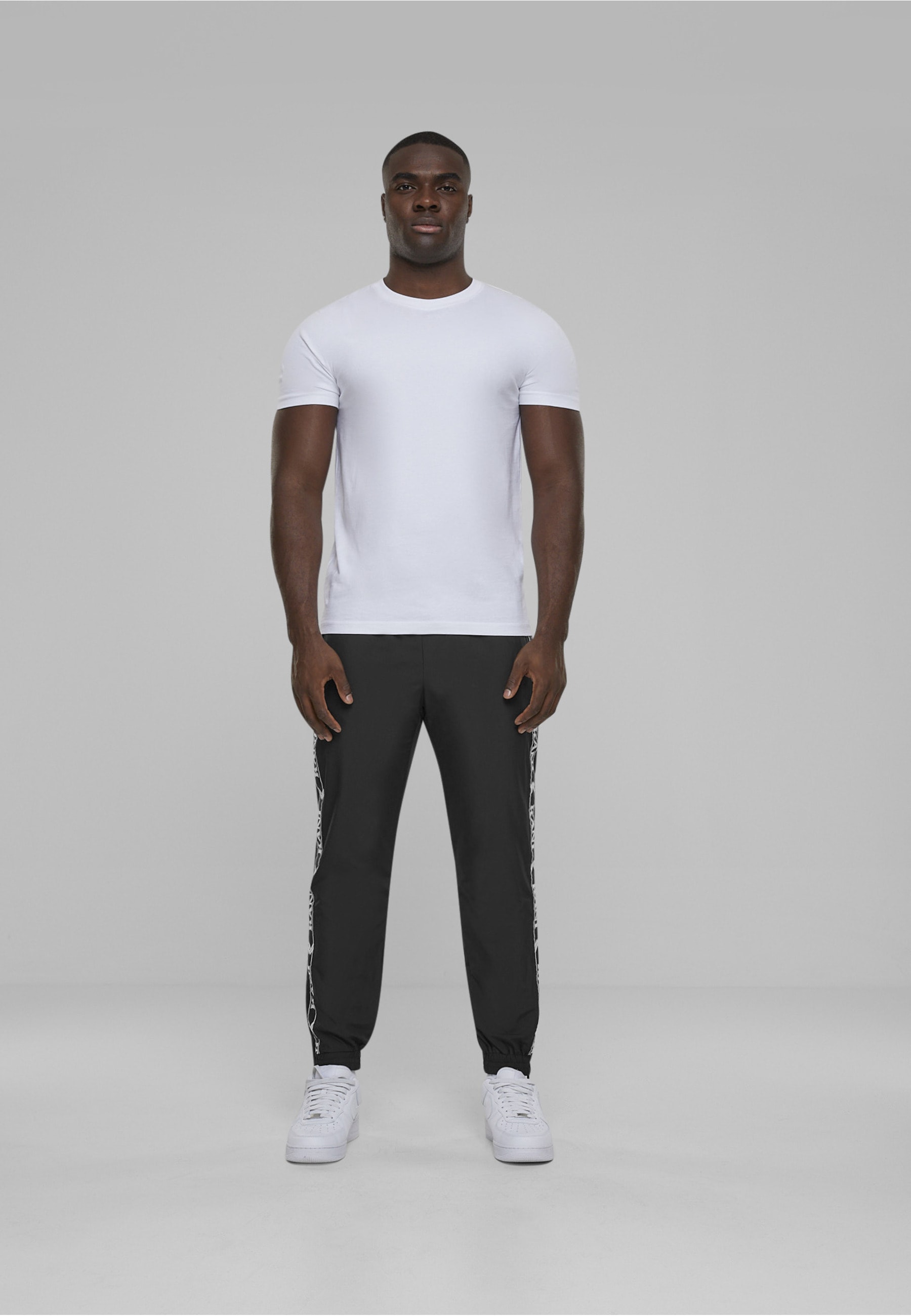 Karl Kani Jogginghose »Karl Kani Herren KKMQ32025BLK KK OG Tape Trackpants«