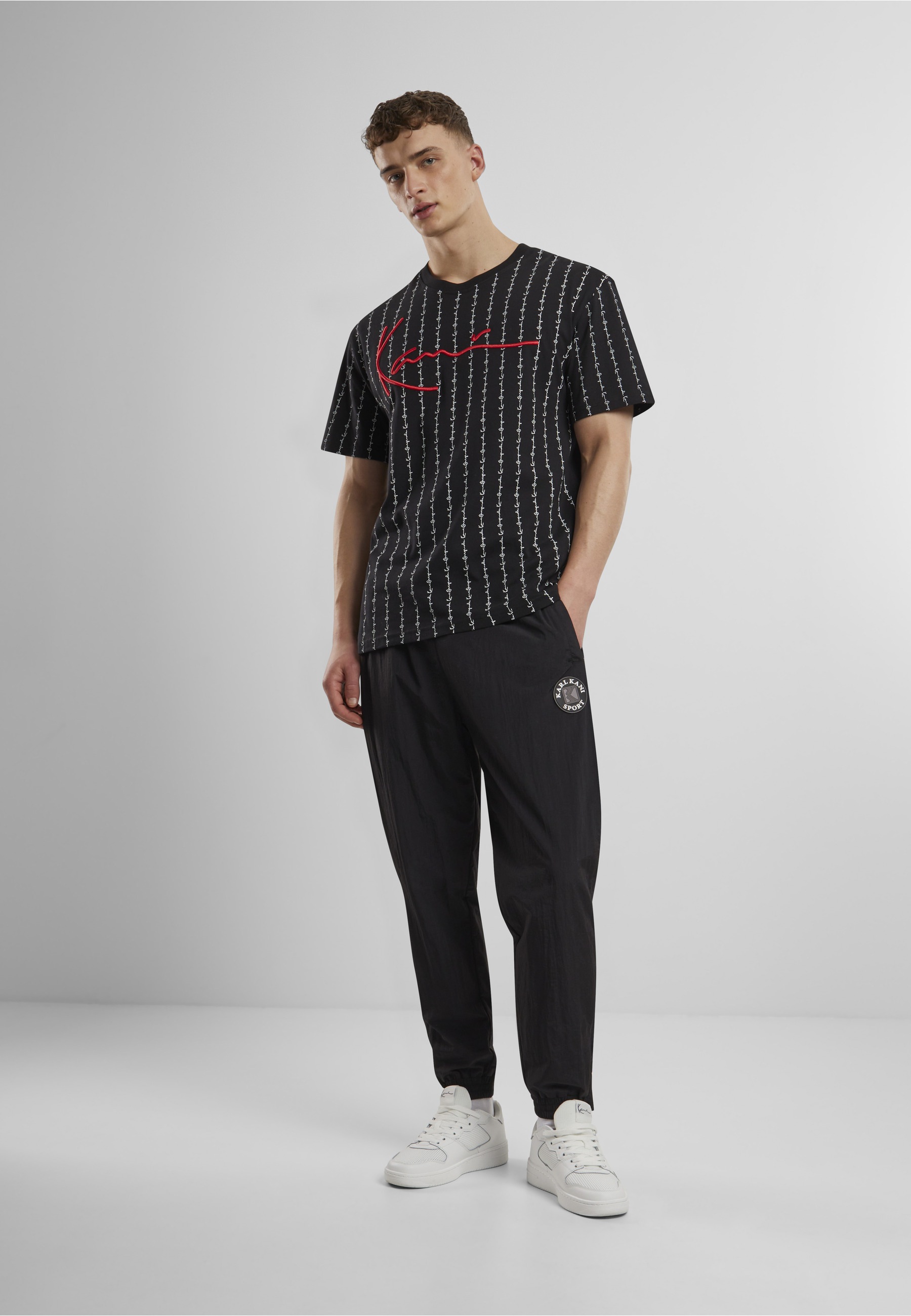 Karl Kani T-Shirt »Karl Kani Herren KKMQ12130BLK Signature Logo Pinstripe Tee« 1 Stk.