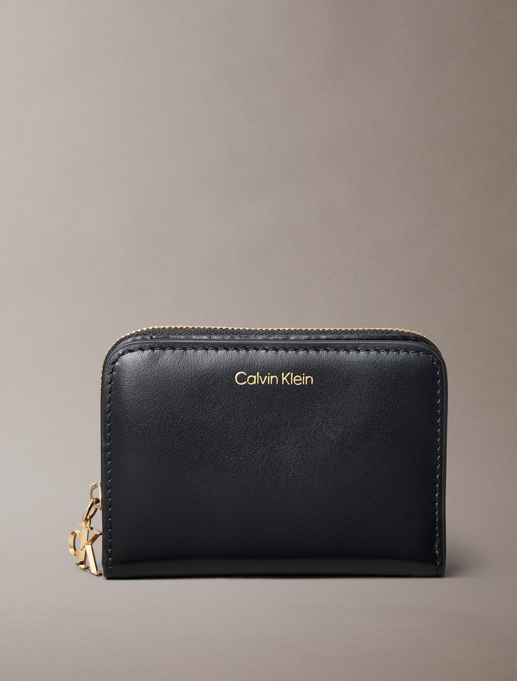 Calvin Klein Geldbörse "CK PULLER MEDIUM FLAP ZIP AROUND" Damen Geldbörse, günstig online kaufen