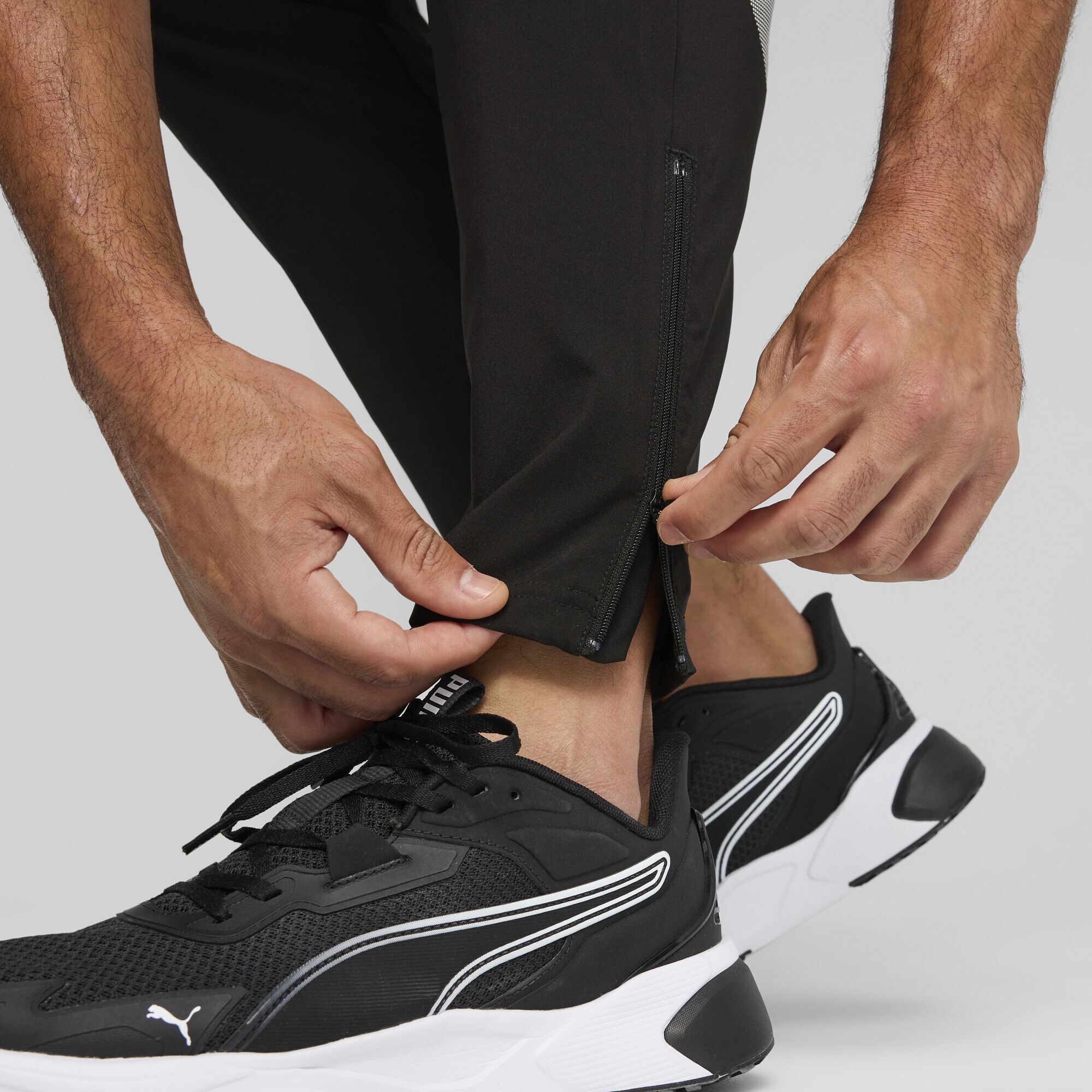 PUMA Trainingshose »Train All Day Big Logo Gewebte Hose Herren«