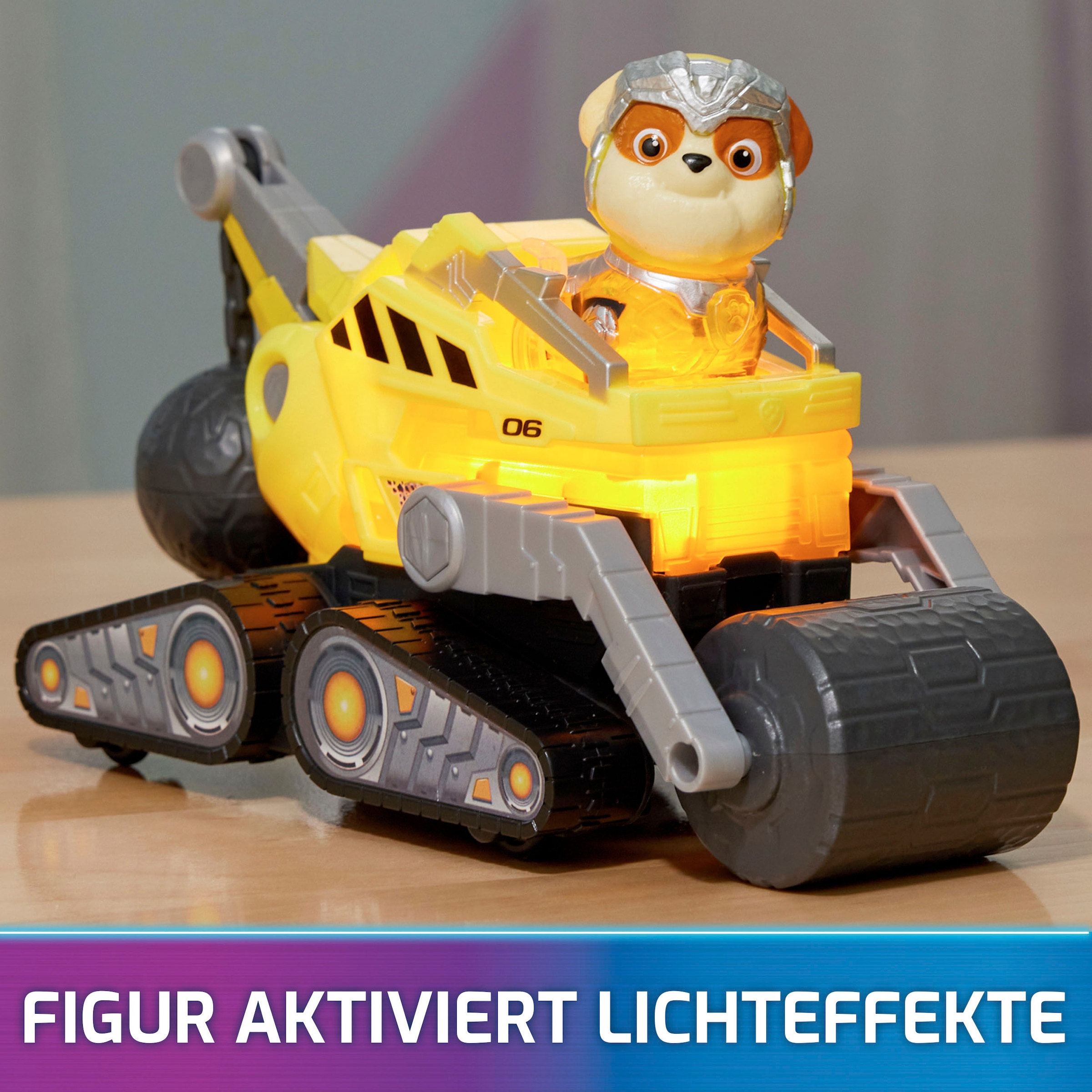 Spin Master Spielzeug-Auto »Paw Patrol - Movie II - Basic Themed Vehicles Rubble«, Baustellenfahrzeug mit Welpenfigur, Licht- und Soundeffekt