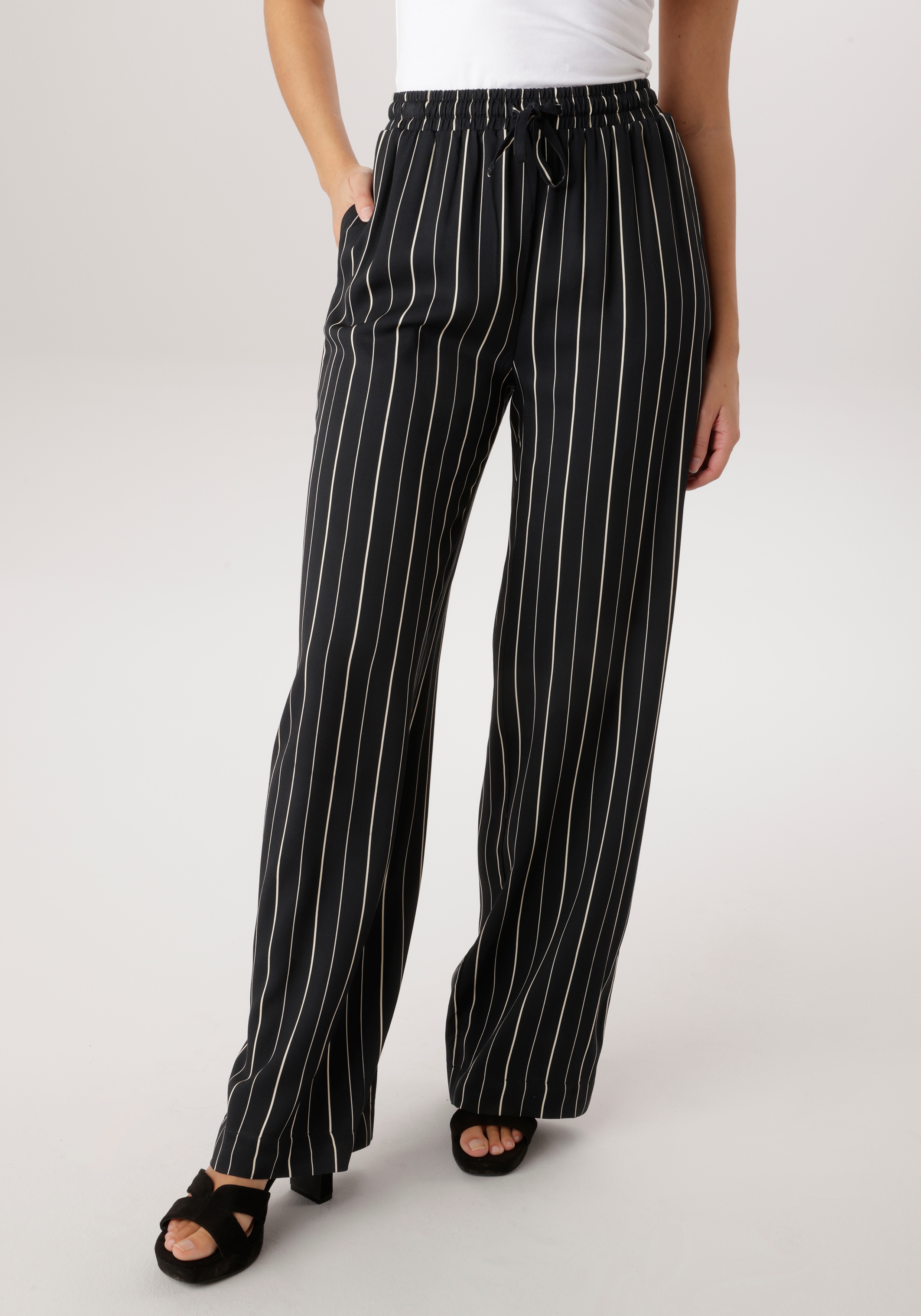 Aniston SELECTED Schlupfhose mit trendigen Streifendessin