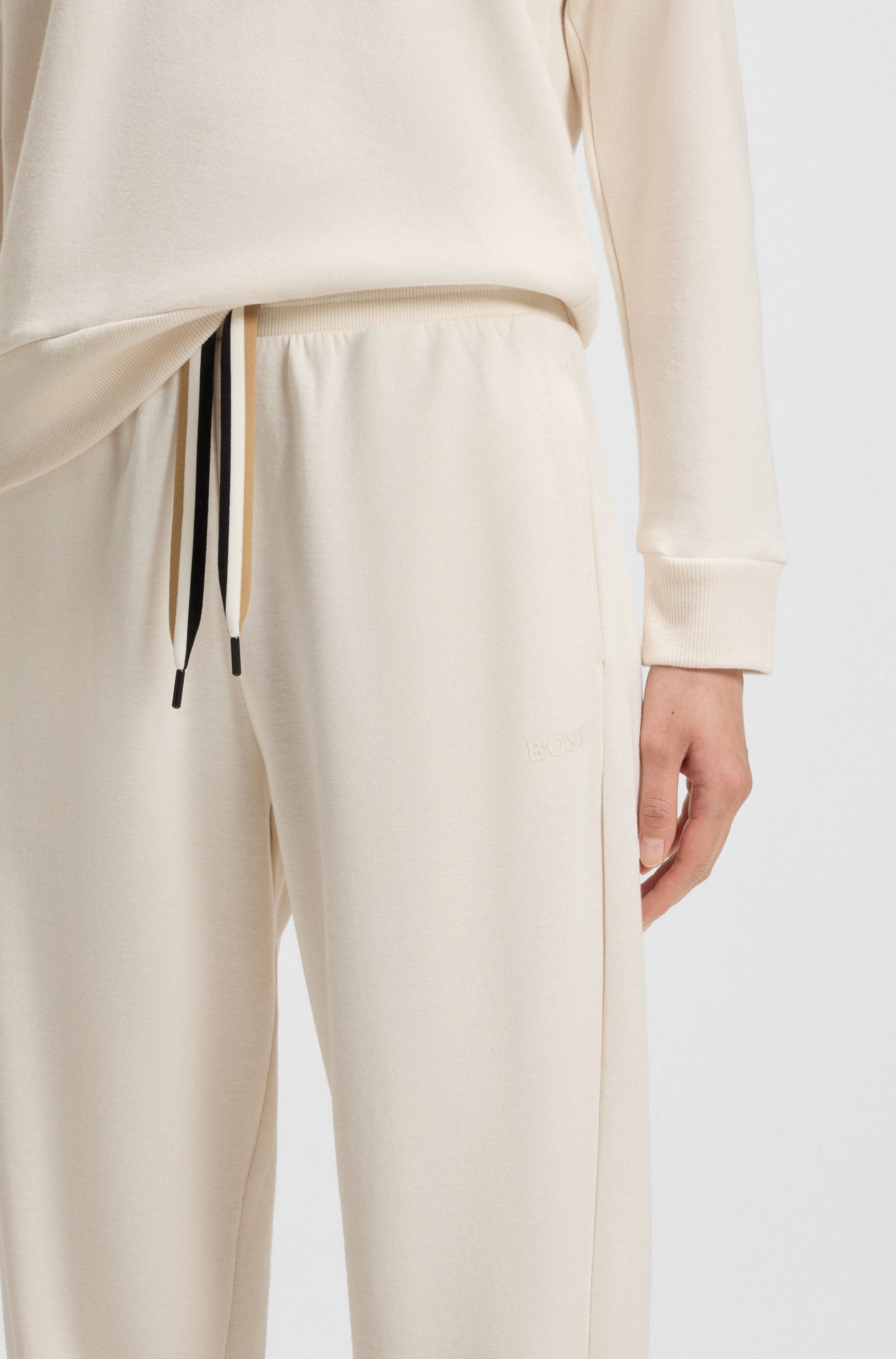 BOSS Relaxhose "CP Stripe Pants Cuff", mit kontrastfarbener Kordel günstig online kaufen