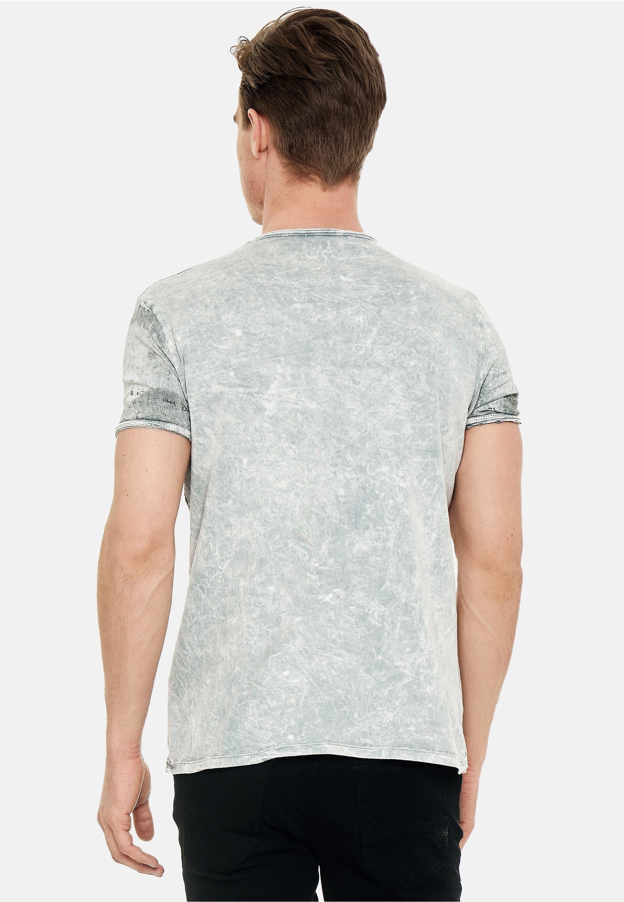 Rusty Neal T-Shirt mit eindrucksvollem Print