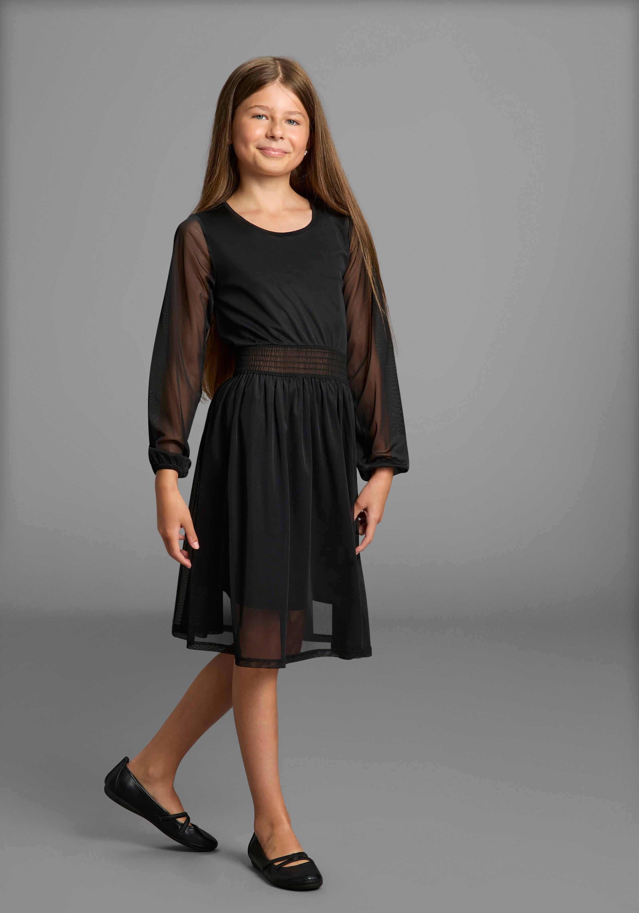 Jerseykleid BRUNO BANANI "Chiffonkleid mit transparenten Ärmeln für festliche Anlässe", Mädchen, Gr. 140/146, N-Gr, schwarz, Jersey, Obermaterial: 95% Polyester, 5% Elasthan. Futter: 100% Polyester, Mesh, leicht transparent, unifarben, festlich, ausgestel