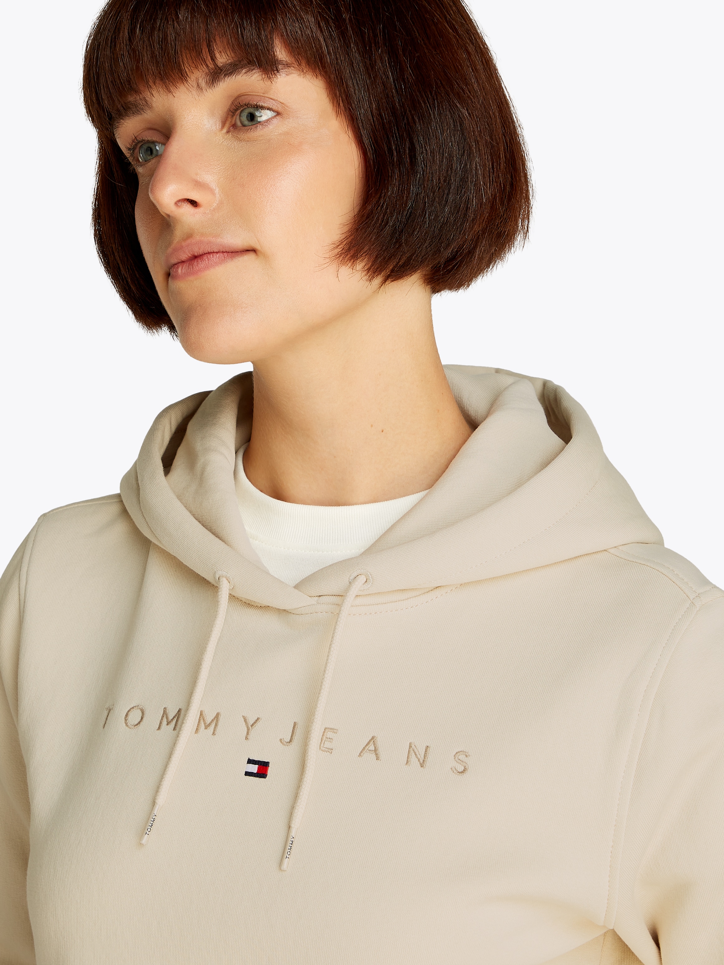 Tommy Jeans Hoodie »TJW REG TONAL LINEAR HOODIE EXT«, mit Kängurutasche, Logoschriftzug