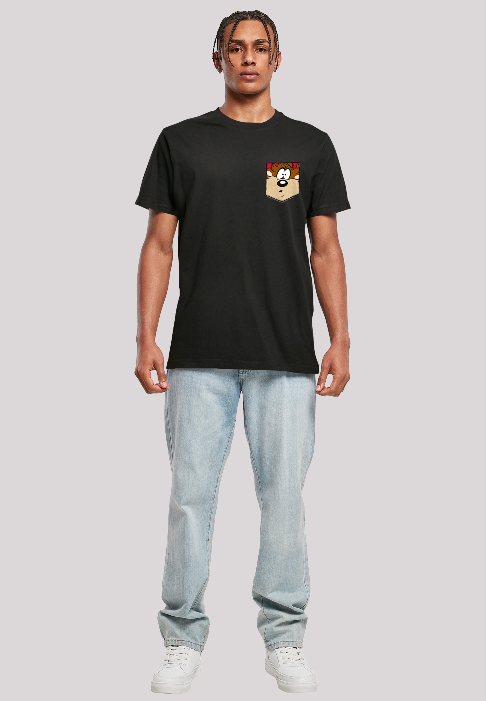 F4NT4STIC T-Shirt »Looney Tunes Tasmanian Devil Face Faux Pocket«, Print