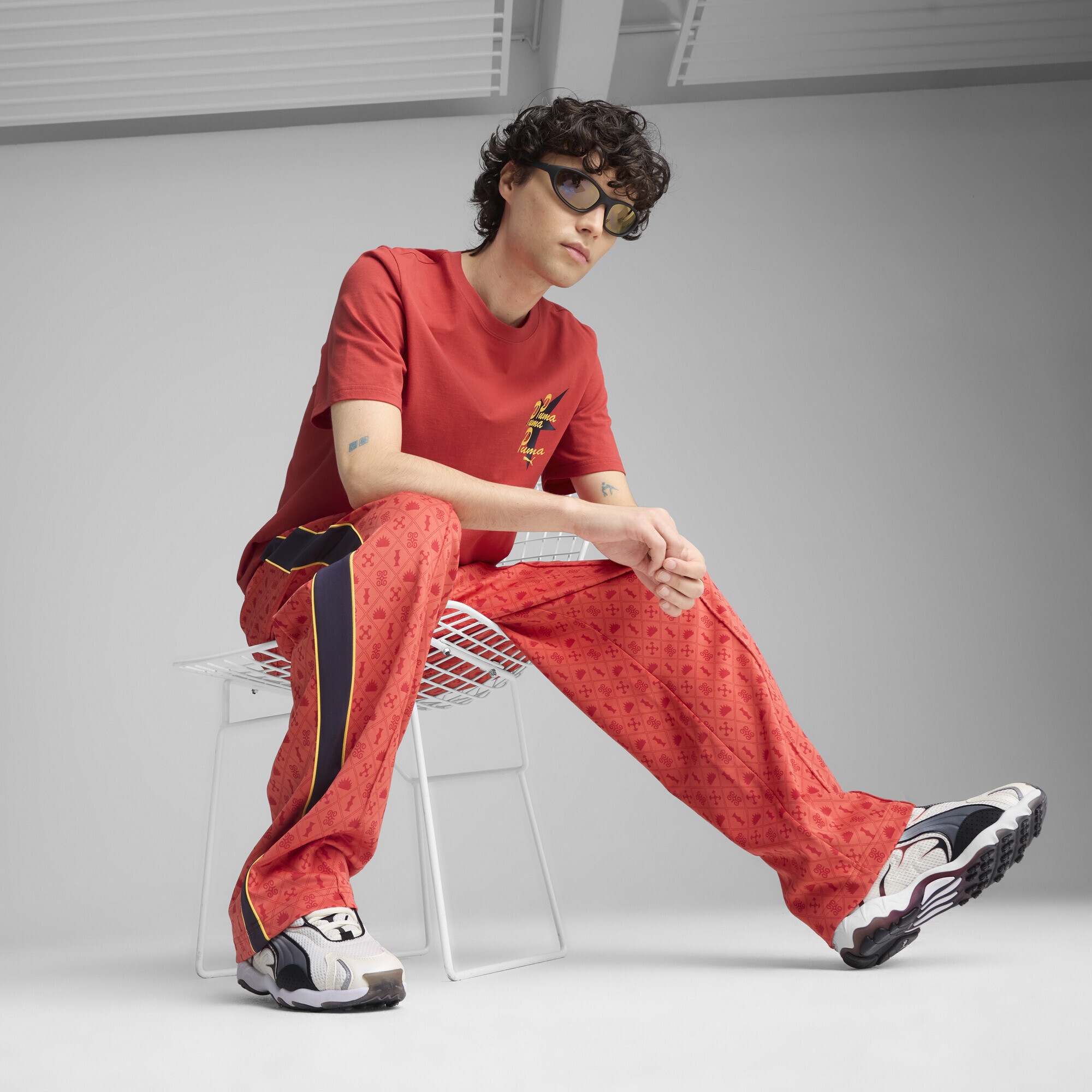PUMA Sporthose »Road To Unity Graphic Relaxed Trainingshose Herren«