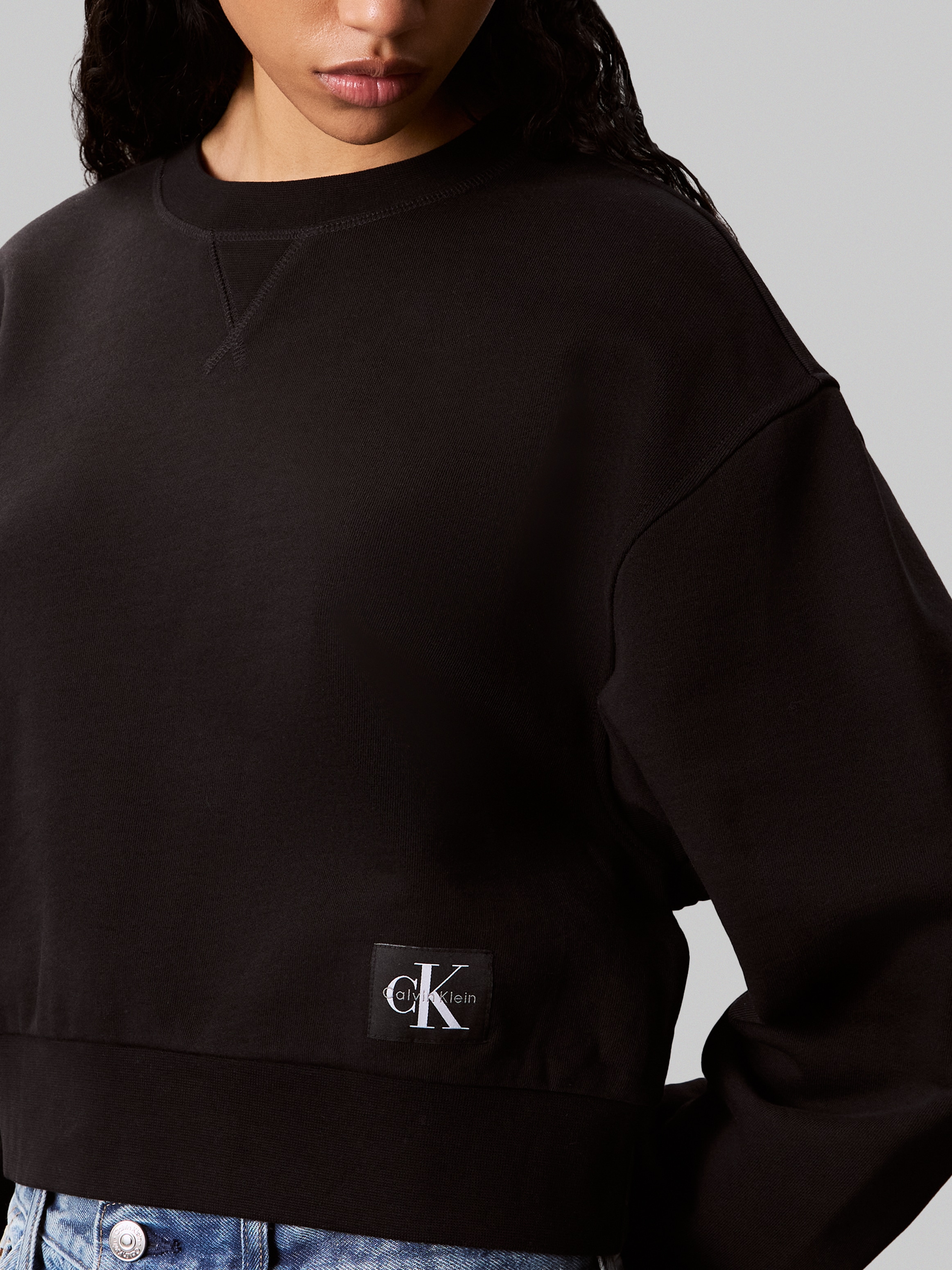Calvin Klein Sweatshirt »FRENCH TERRY WOVEN LABEL CREW«, Regular fit mit Rundhalsausschnitt
