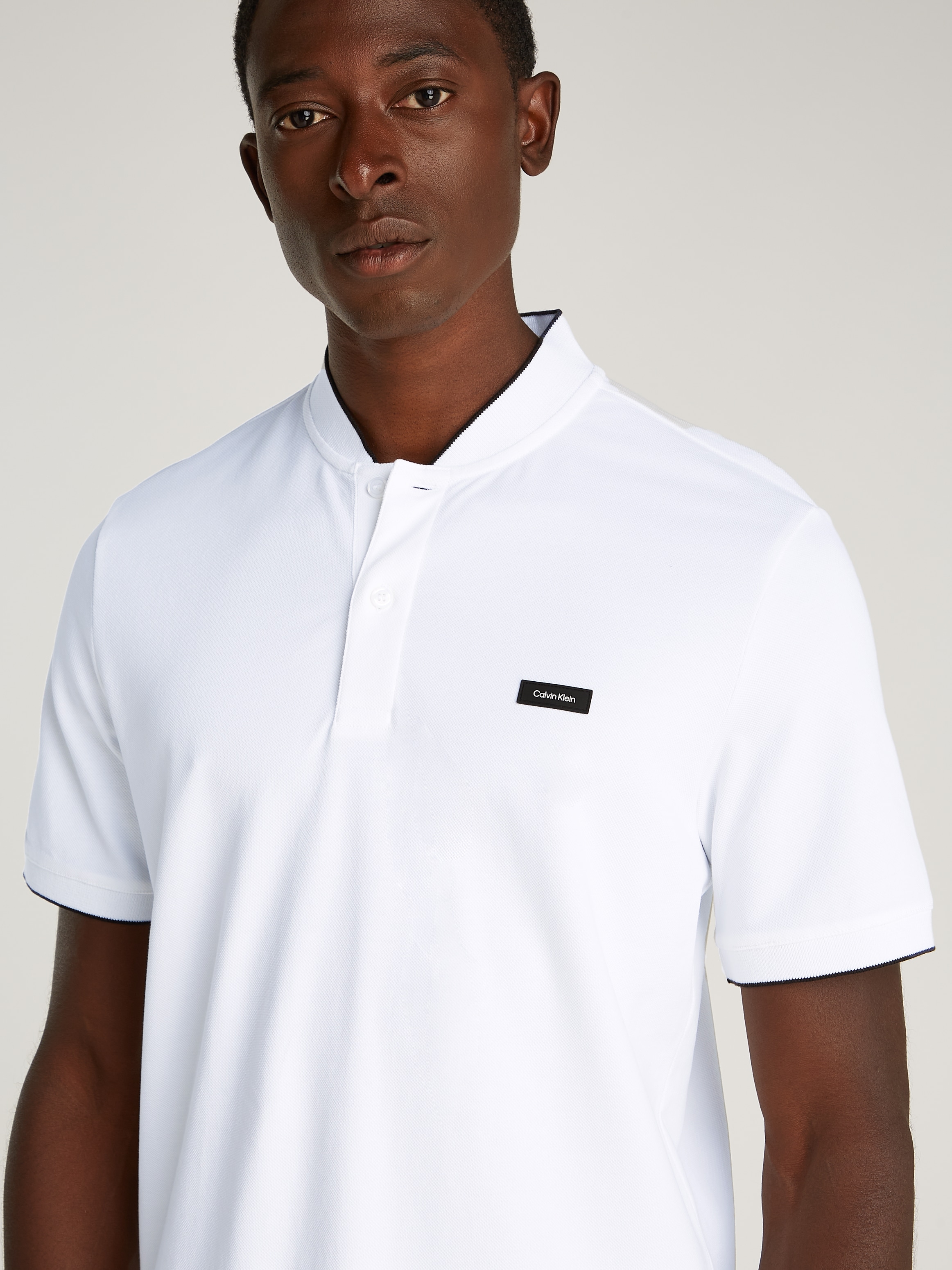 Calvin Klein Poloshirt »STRETCH PIQUE STAND COLLAR POLO«, mit kontrastfarbenen Kanten