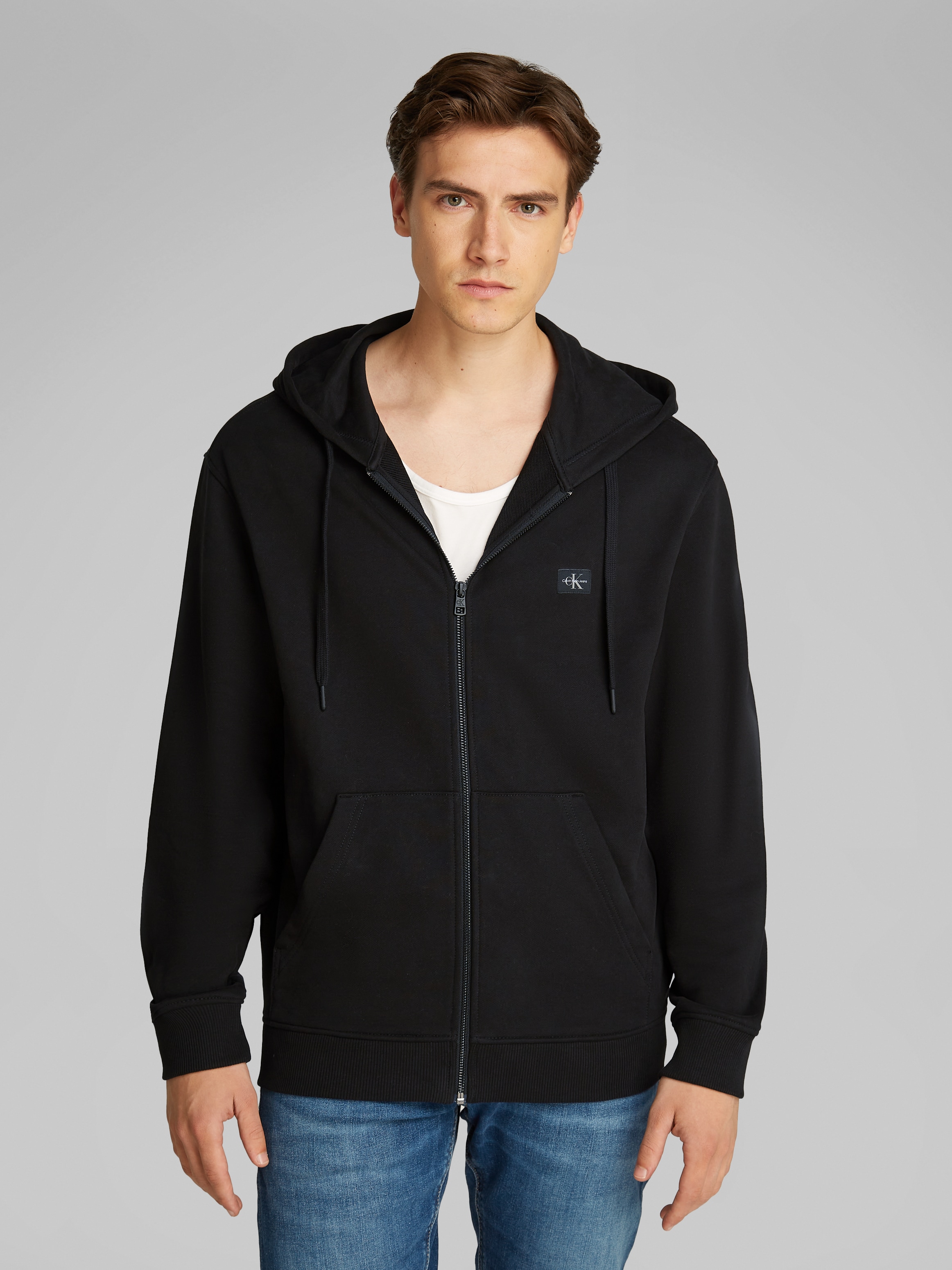 Calvin Klein Jeans Sweatjacke "WOVEN LABEL ZIP THROUGH HOODIE", mit Logopat günstig online kaufen