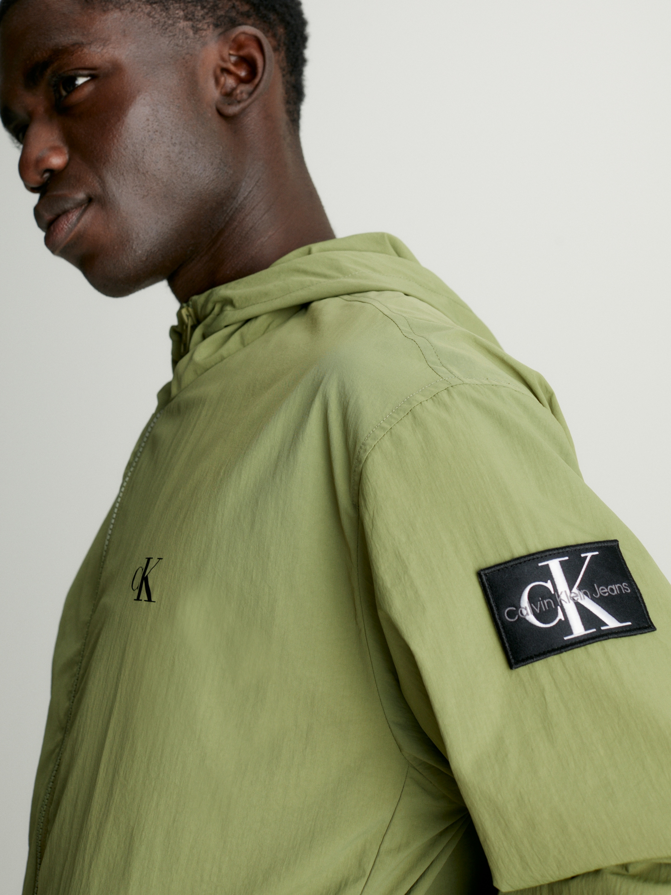 Calvin Klein Jeans Windbreaker »WINDBREAKER«, mit Kapuze, mit Calvin Klein Logo-Badge