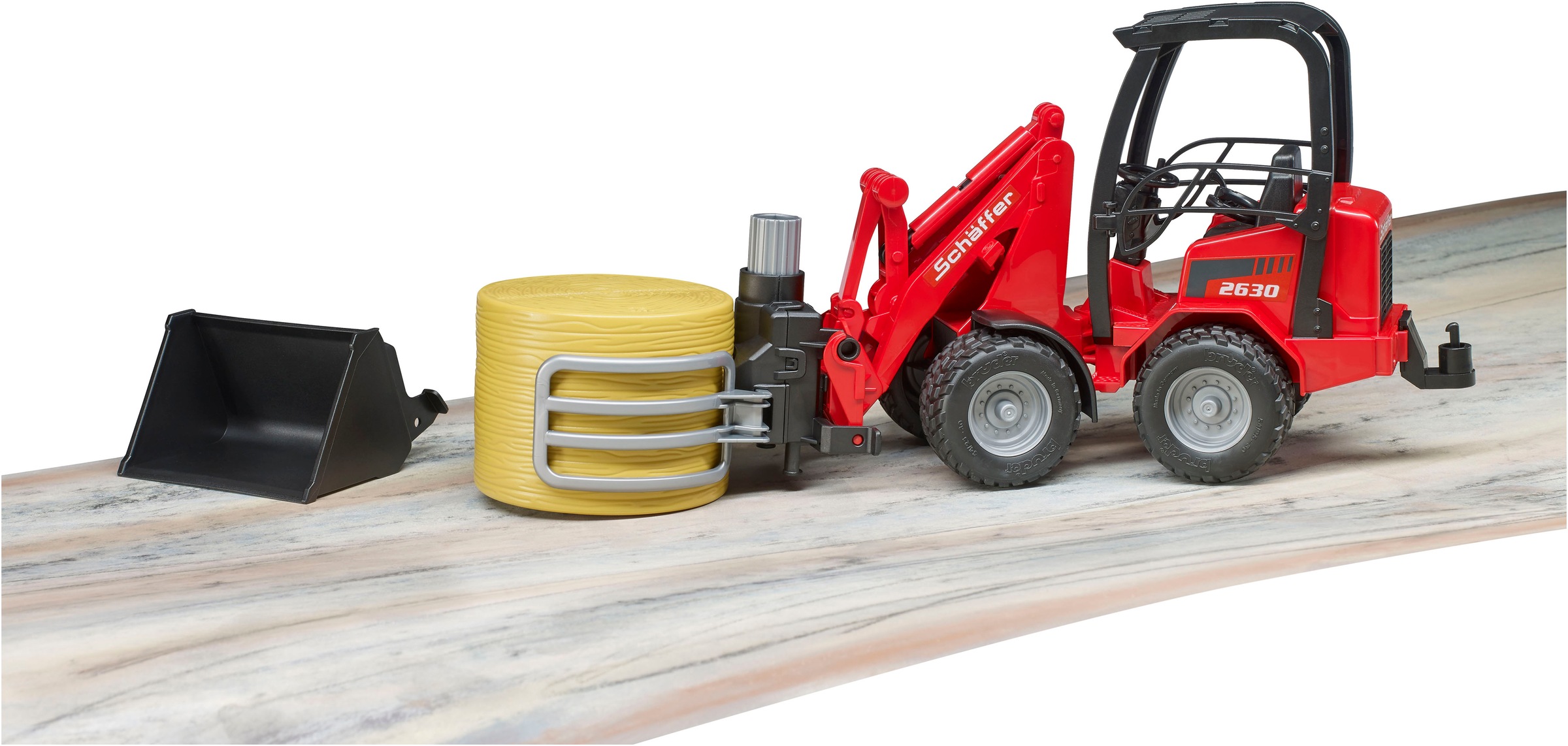 Bruder® Spielzeug-Landmaschine »Schäffer Hoflader 2630/Ballengreifzange/Rundballen (02192)«, Made in Europe