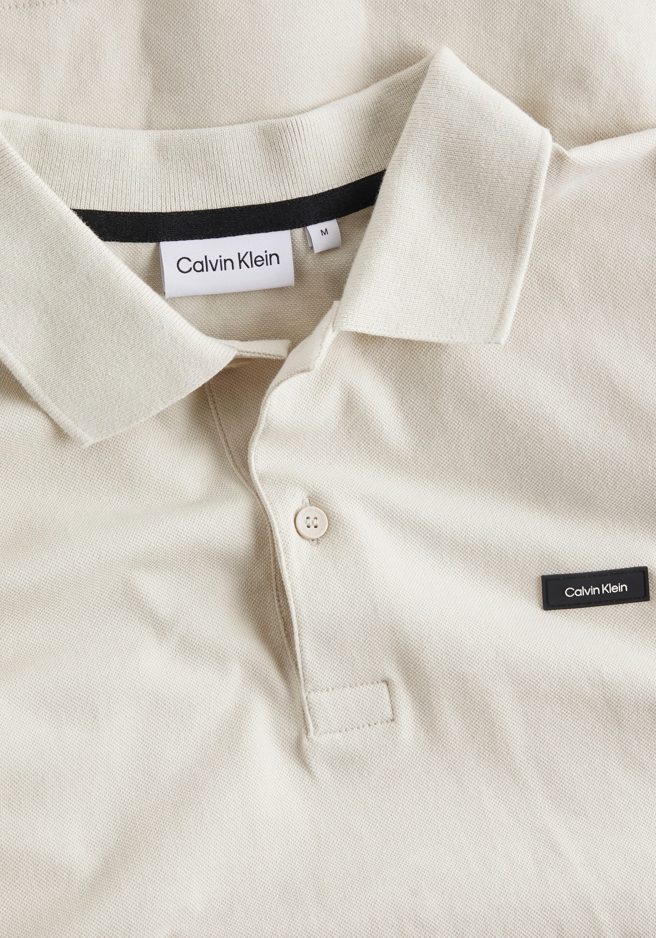 Calvin Klein Poloshirt, mit Calvin Brust auf Klein ▷ Logo der | BAUR bestellen