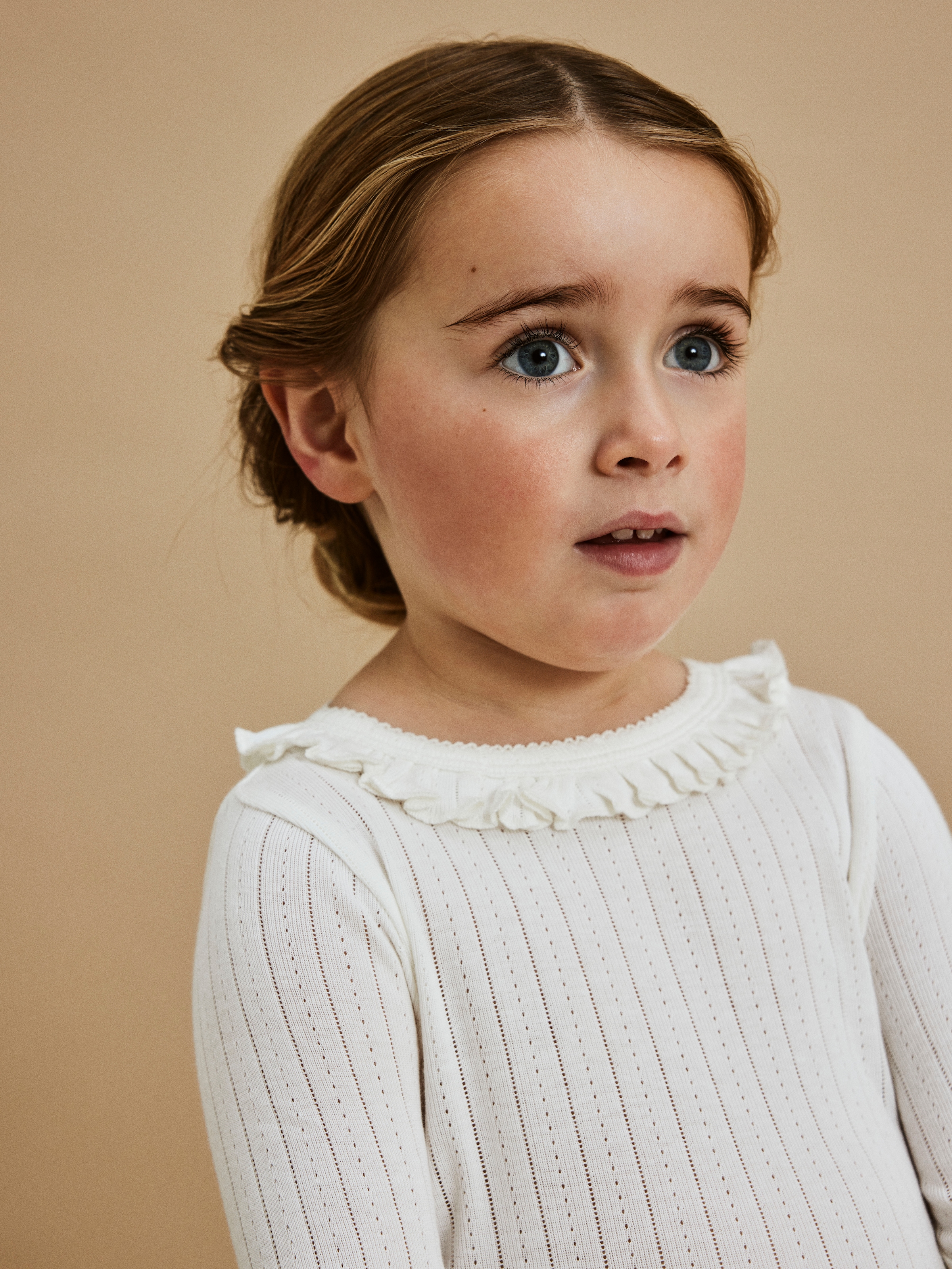 Langarmshirt LIL' ATELIER "NMFRACHEL NIS LS SLIM TOP LIL NOOS", Mädchen, Gr. 92, coconut milk, Jersey, Obermaterial: 50% Baumwolle, 50% Modal, unifarben, slim fit normal, Rundhals, Shirts Langarmshirt, Baumwollmischung, Rüschen