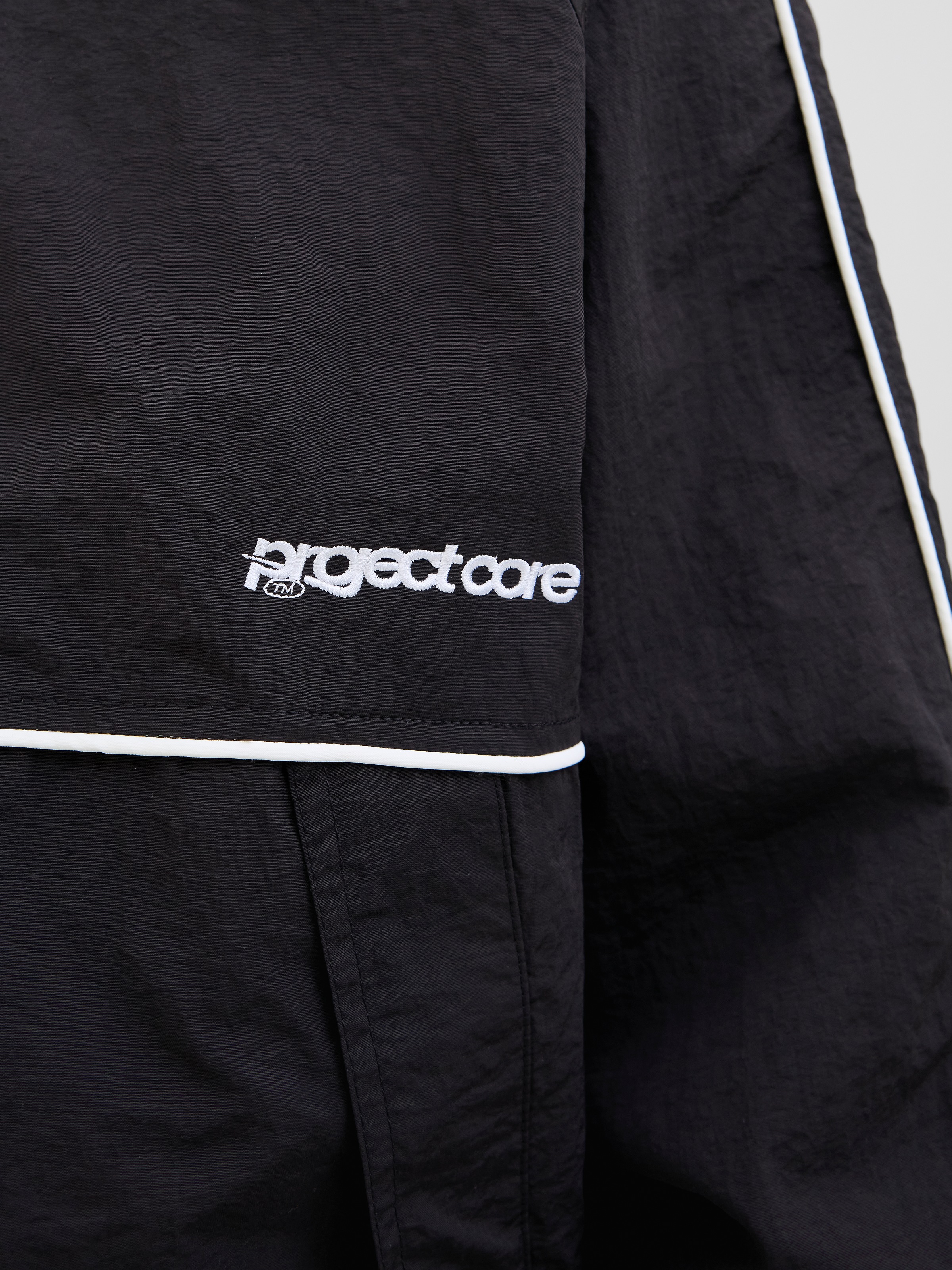 Jack & Jones Outdoorjacke »JCOUNION TRACK JACKET SN«, ohne Kapuze, Mit stylischem Print