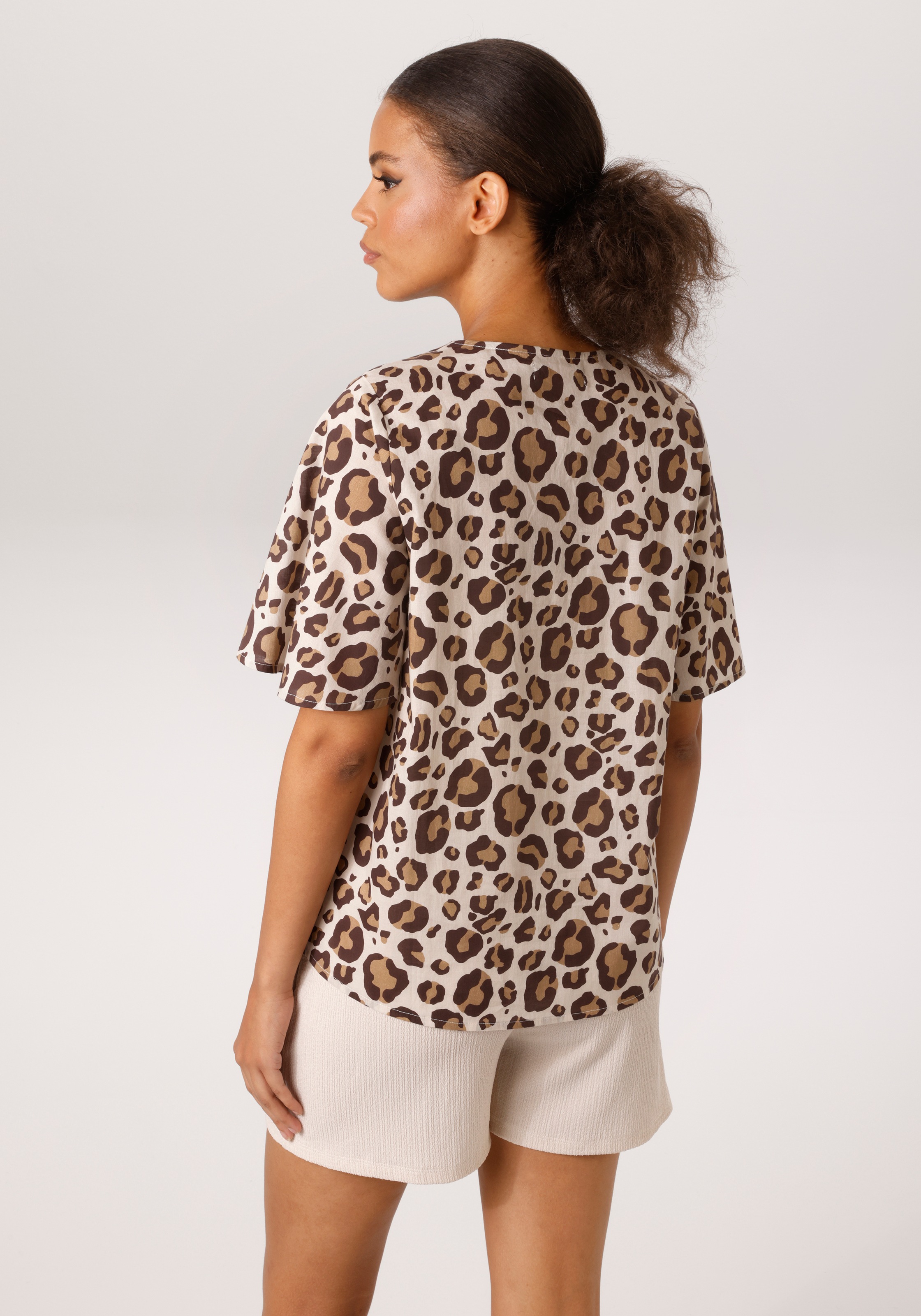 Aniston CASUAL Schlupfbluse im farbharmonischen Leoprint - jedes Teil ein U günstig online kaufen