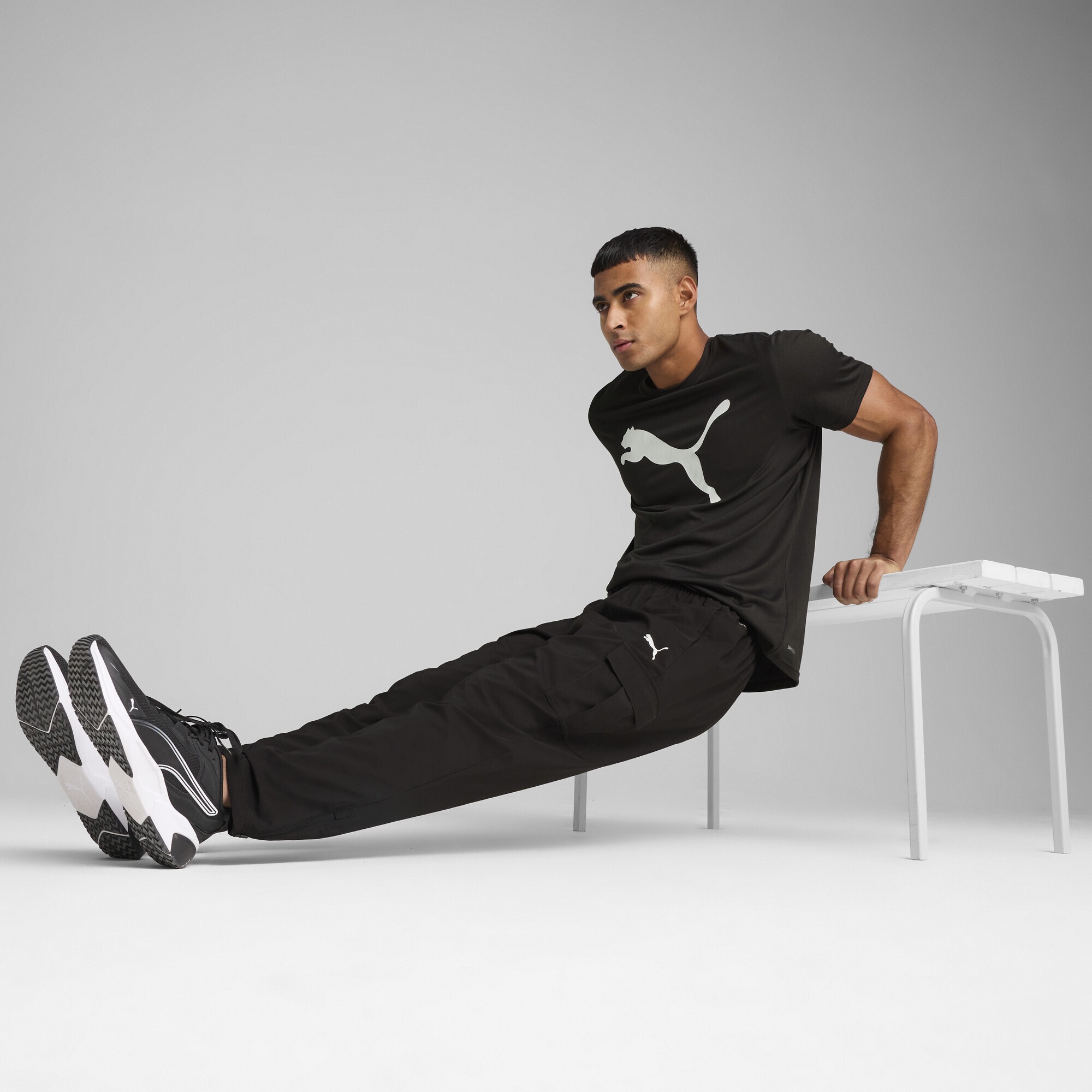 PUMA Trainingshose »TAD TECH Gewebte Cargohose Herren«