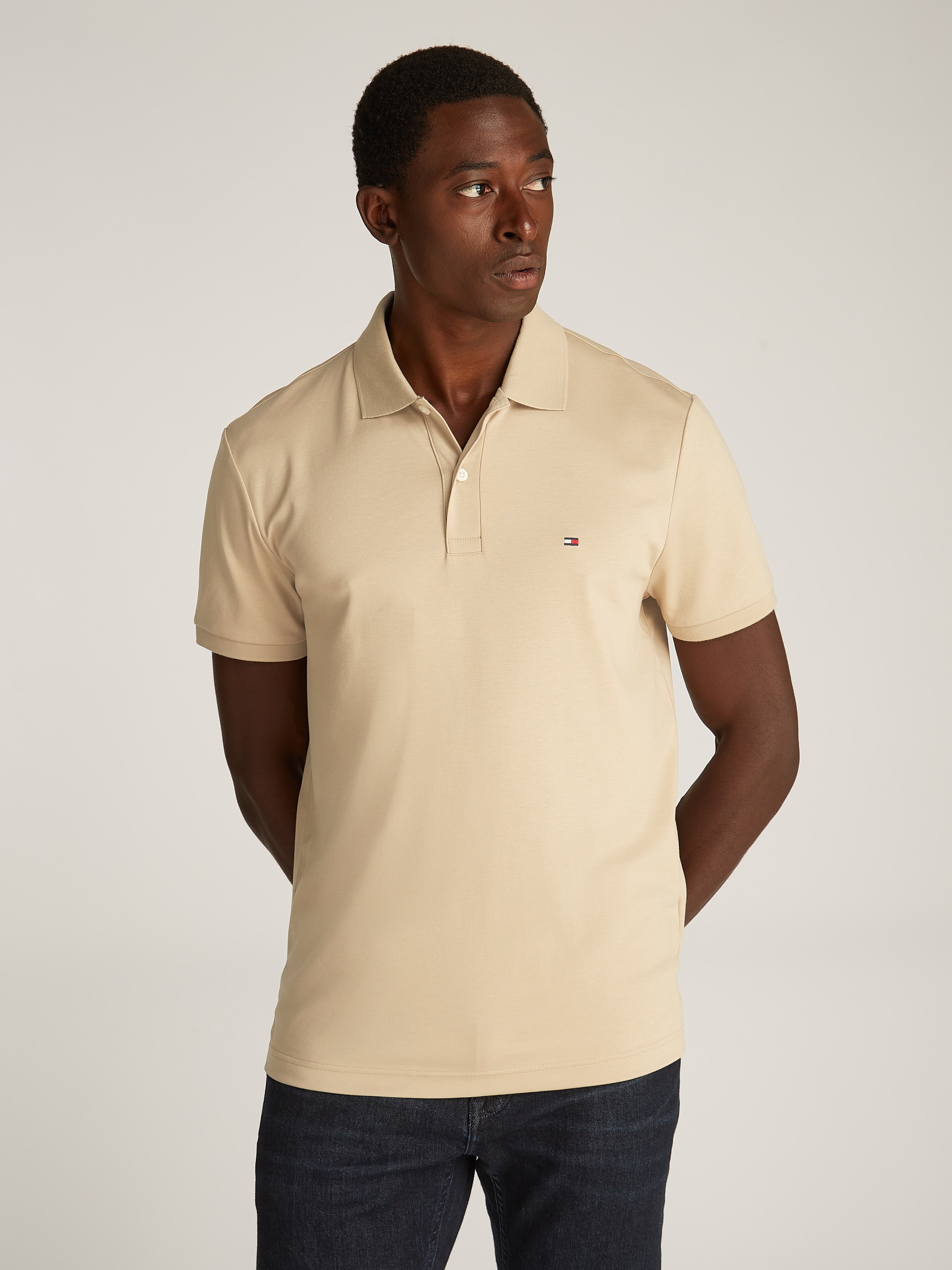 Tommy Hilfiger Poloshirt "LIQUID COTTON REG SEASONAL POLO", mit Logosticker günstig online kaufen