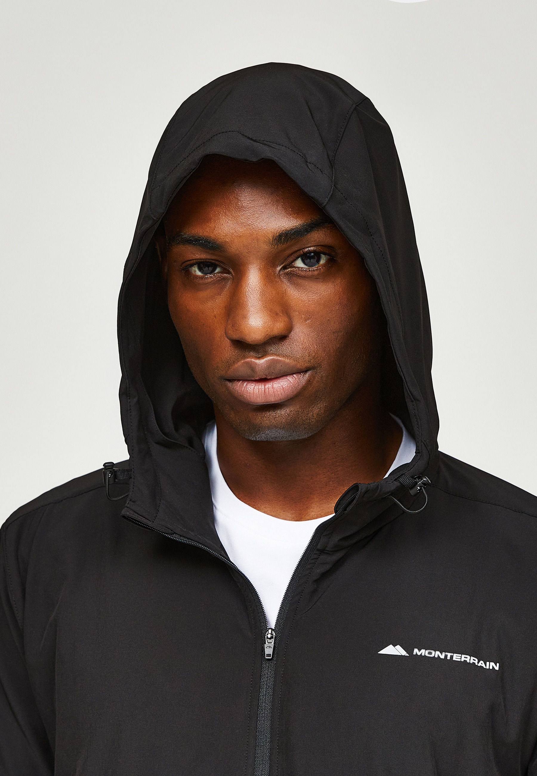 Monterrain Langmantel »Monterrain FORM WOVEN RUNNING JACKET«