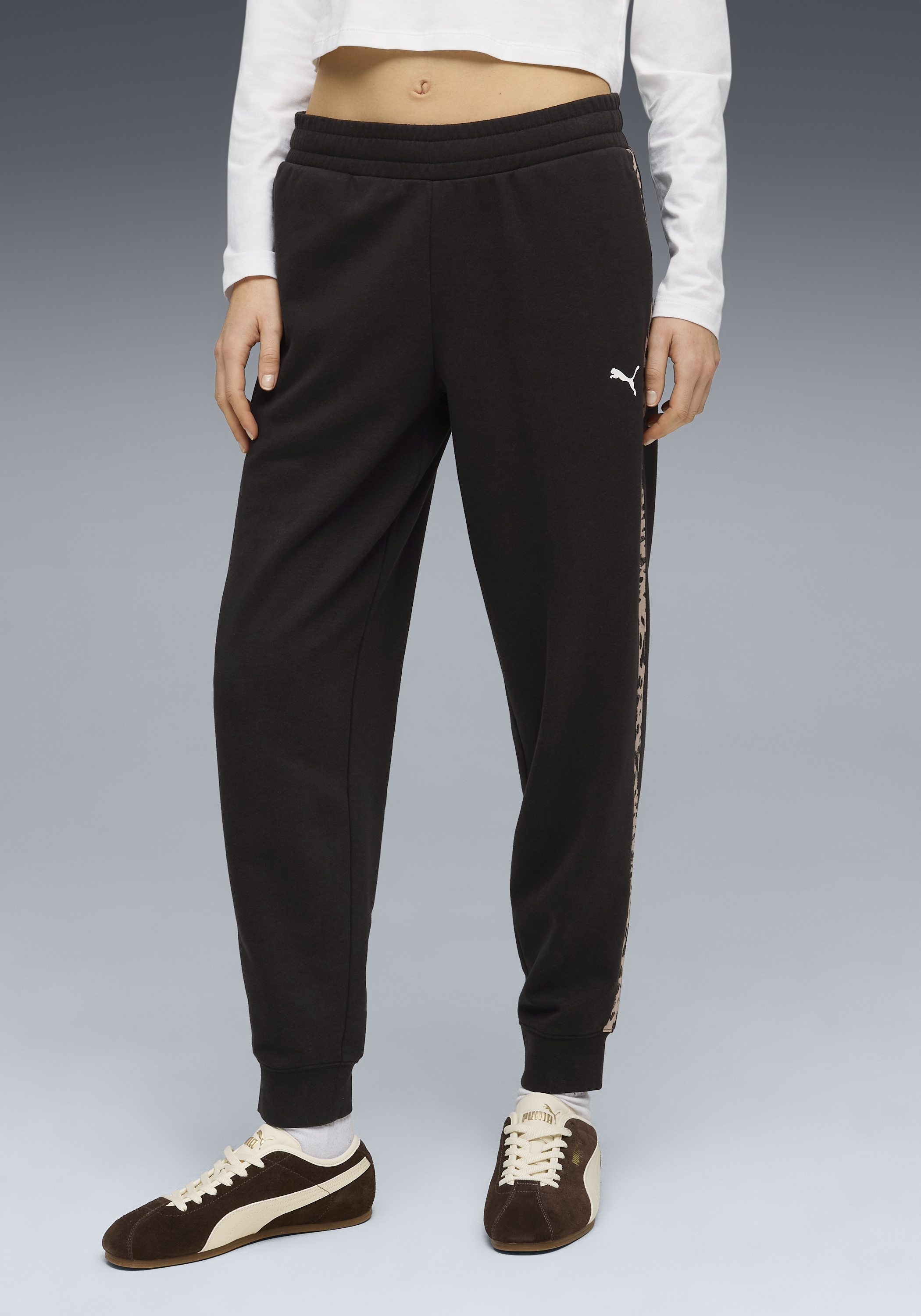PUMA Trainingshose "ESS GRAPHIC ANIMAL COMFORT PANTS TR CL" mit Eingrifftaschen, sportlicher Stil, mit modernem Print