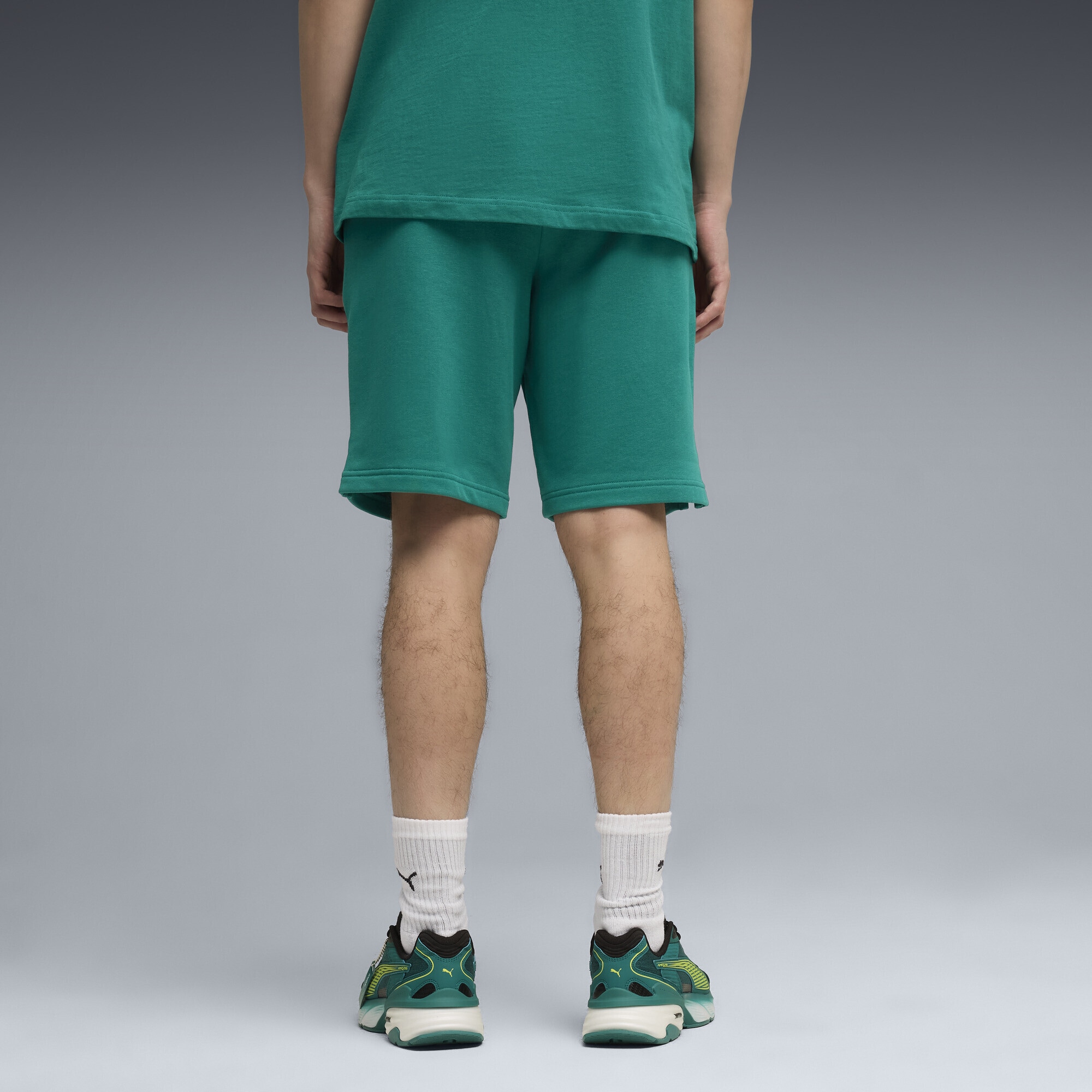 PUMA Sporthose »PUMA x ASTON MARTIN ARAMCO F1® TEAM Essentials Shorts Herren«