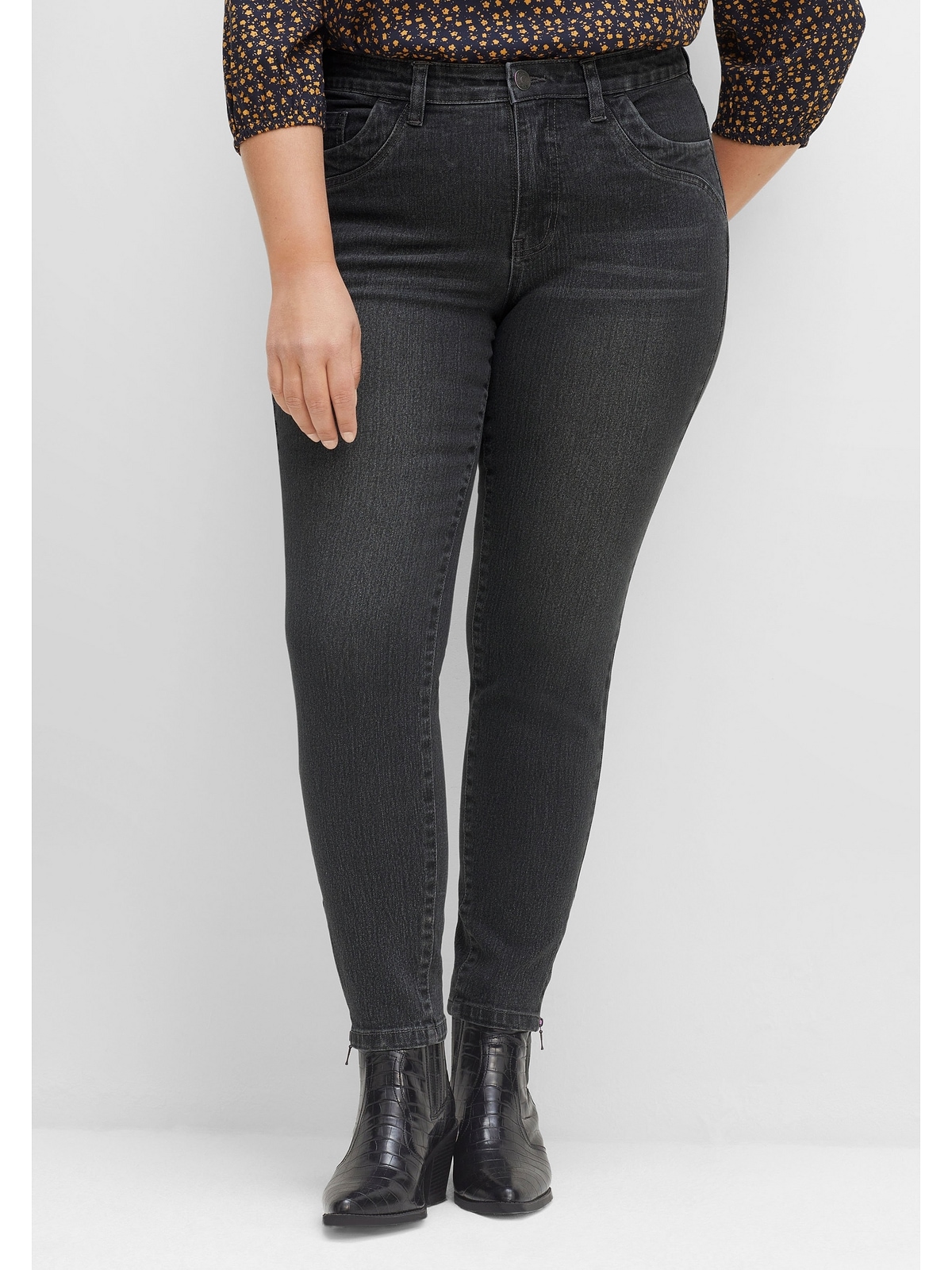 Sheego Stretch-Jeans mit online »Große kaufen Größen«, Zippern BAUR am Saumabschluss 