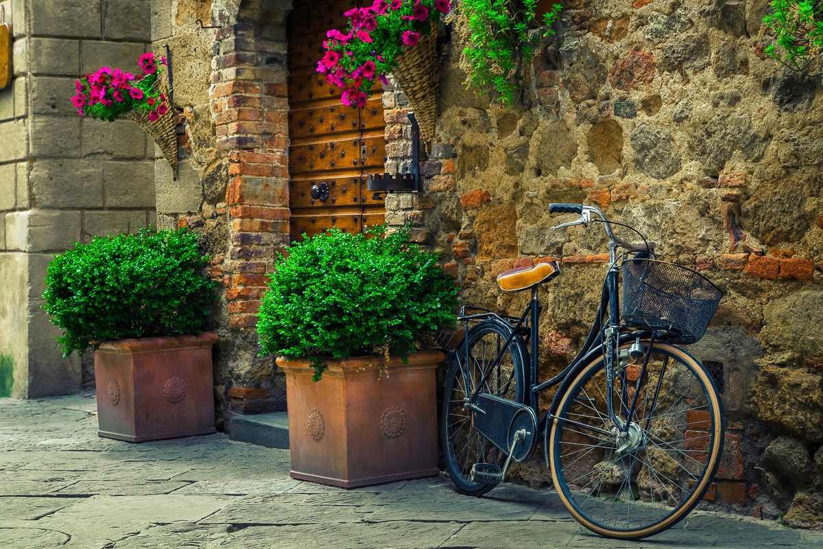 Papermoon Fototapete »Fahrrad vor Steinmauer«