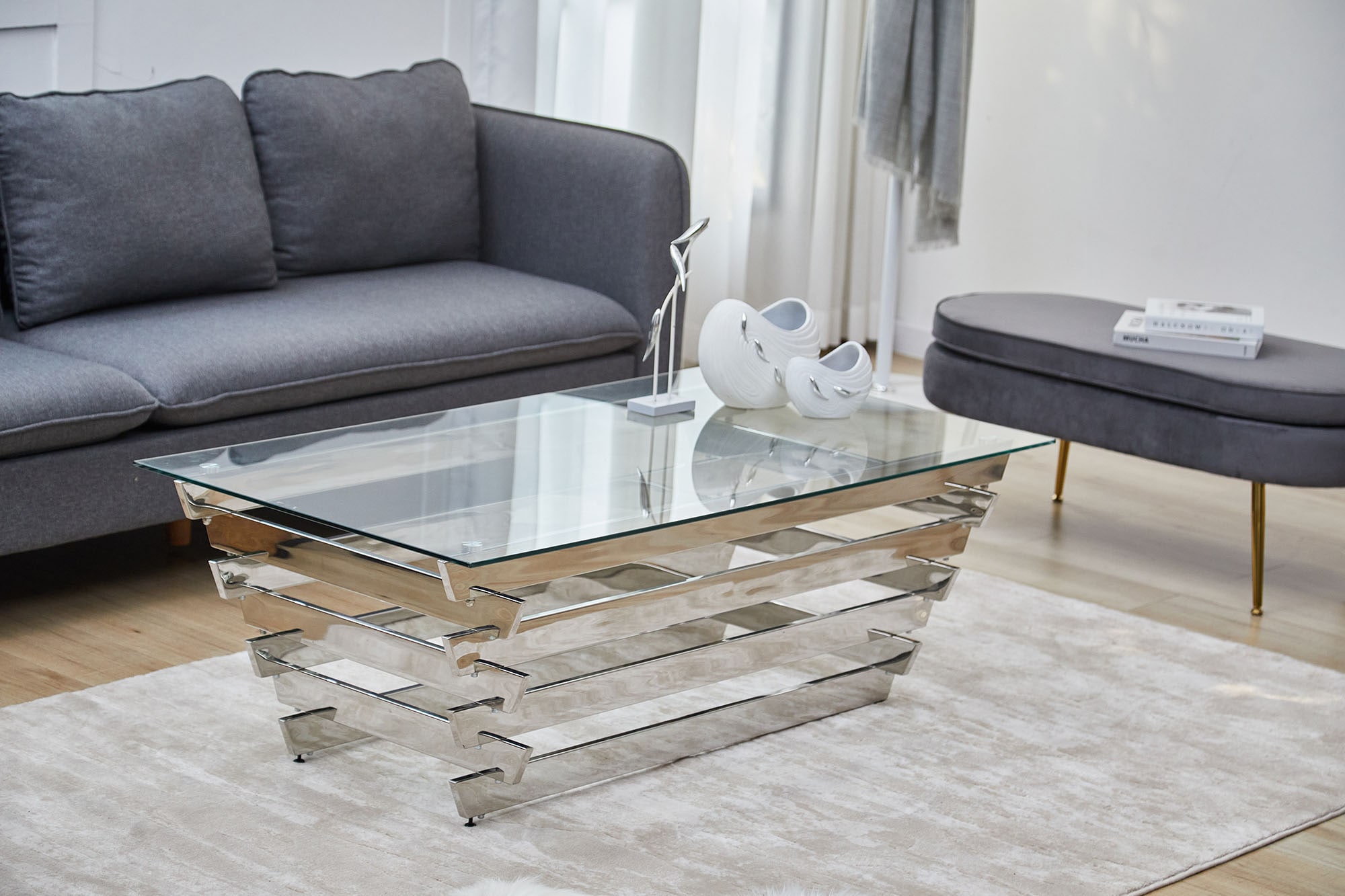 SalesFever Couchtisch, mit Design-Gestell aus Stainless Steel