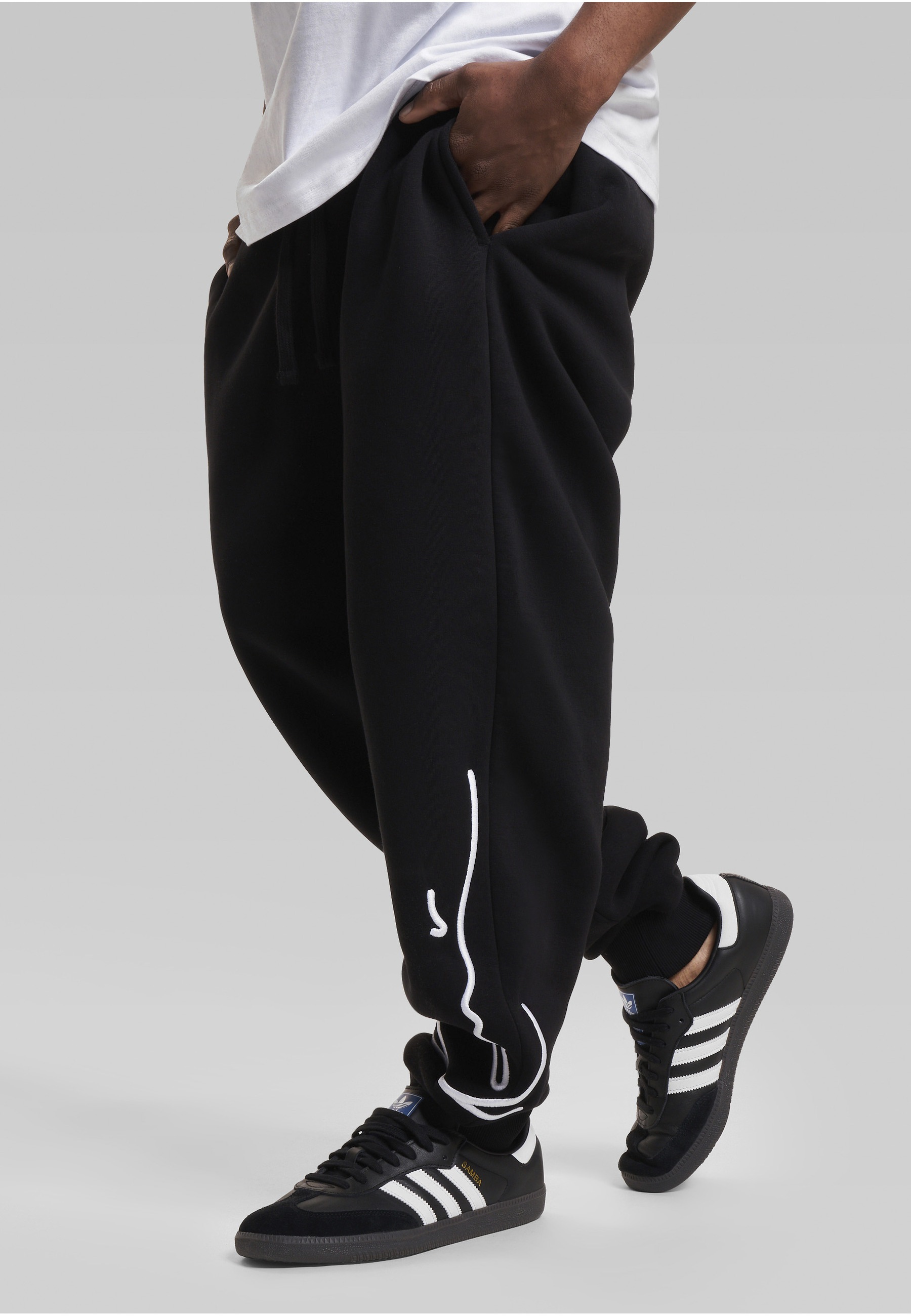 Karl Kani Stoffhose »Karl Kani Herren KKMQ12007 SIGNATURE RETRO SWEATPANTS BLK«