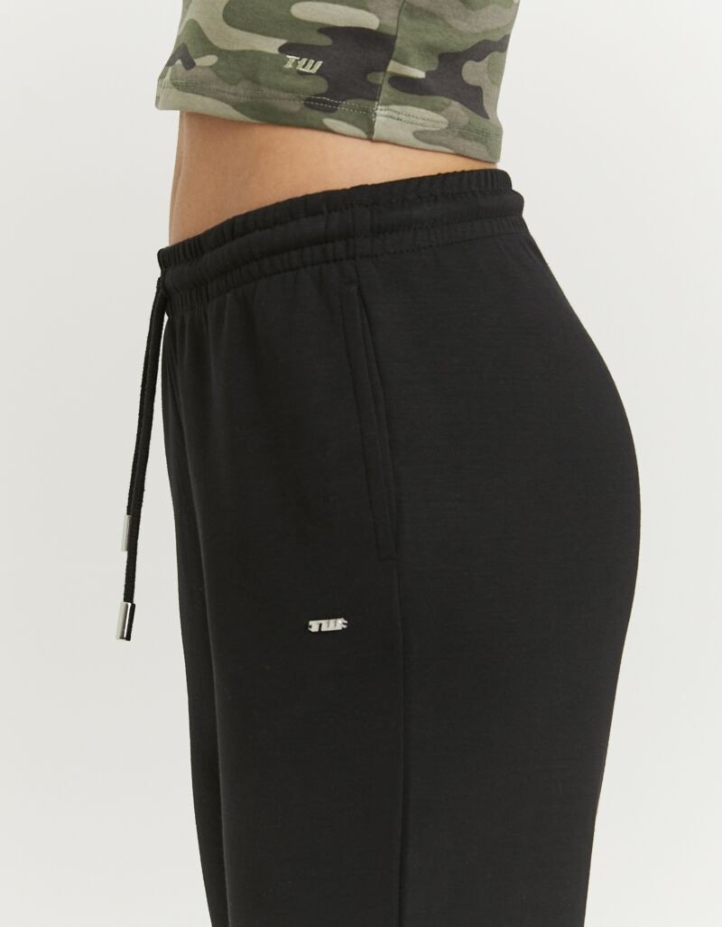 Tally Weijl Sweathose »SPAPEJACIN«  Materialmix, mit ausgestelltem Bein und Bindeband