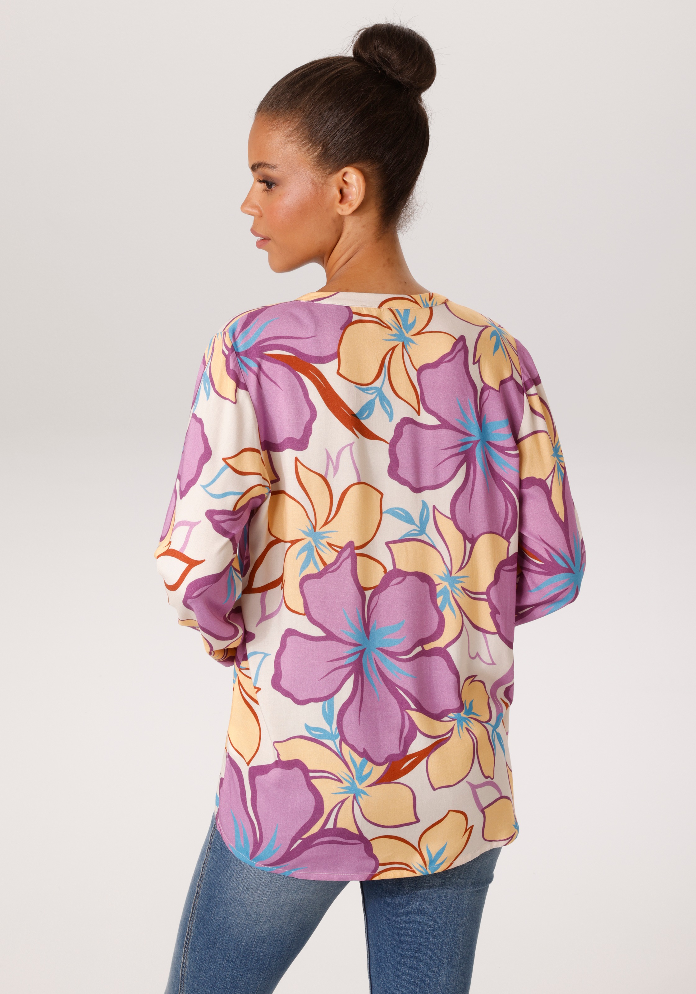 Aniston CASUAL Schlupfbluse mit farbenfrohen, großflächigen Blüten bedruckt günstig online kaufen