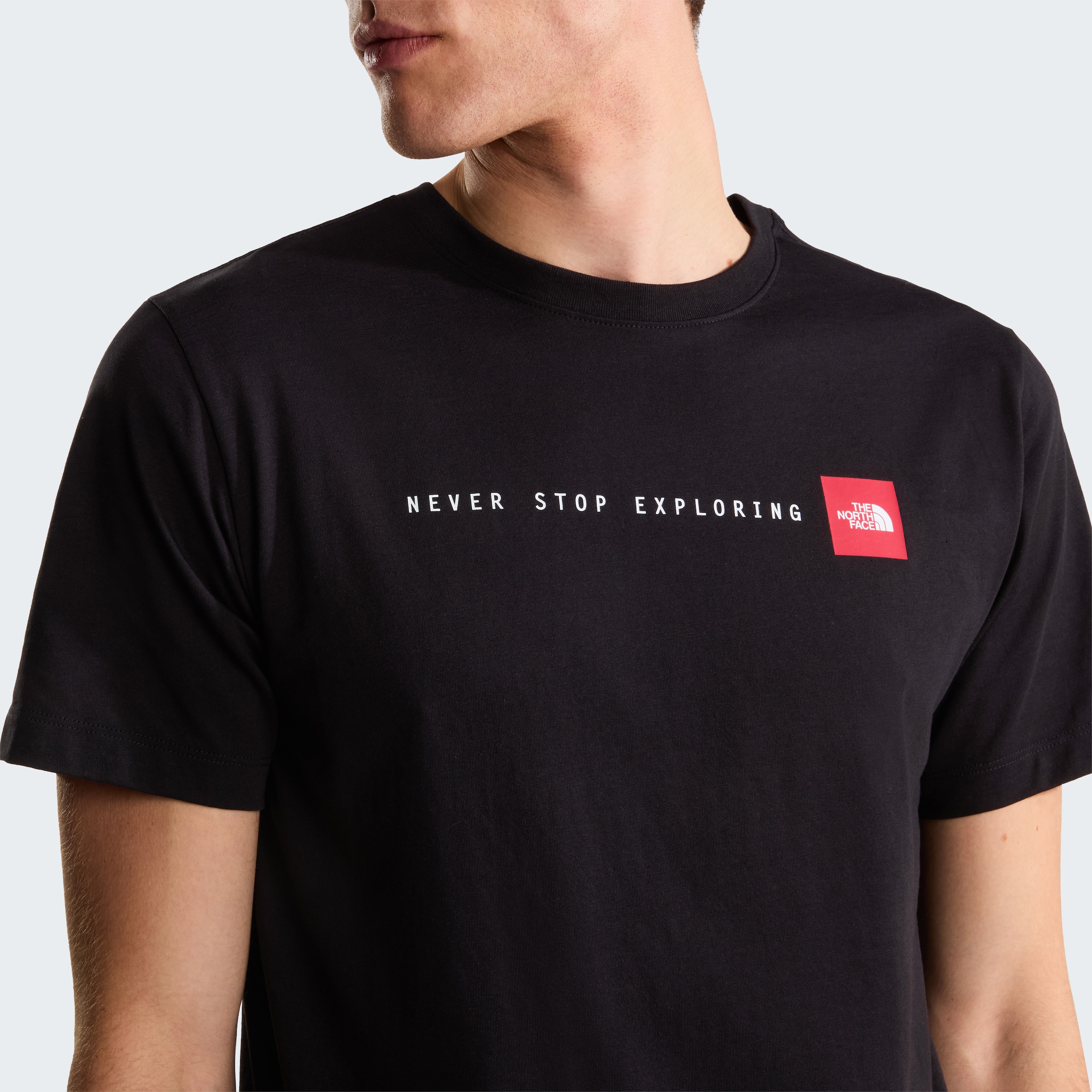 The North Face T-Shirt »M NEVER STOP EXPLORING REGULAR SHORT SLEEVE TEE-GRAPHIC« kurze Ärmel, für Sport und Freizeit, sportlicher Stil