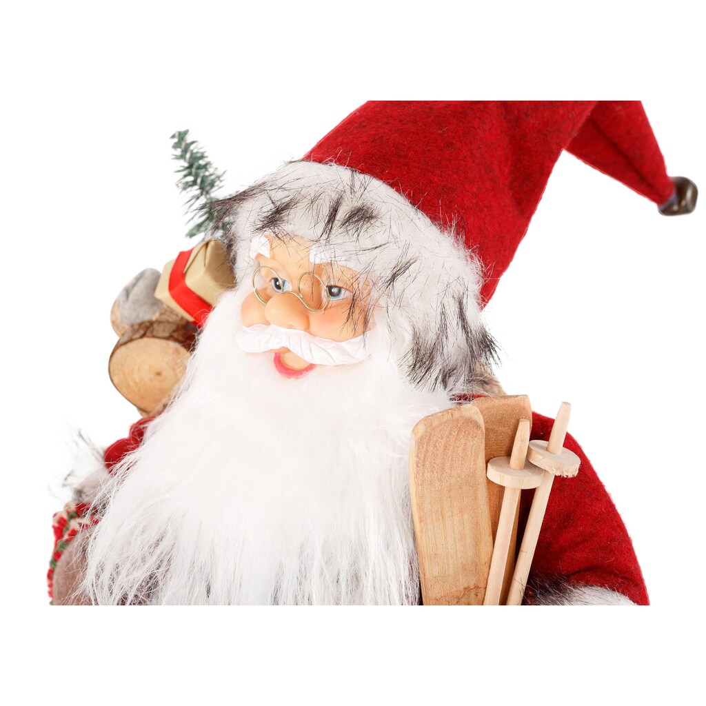 HOSSNER - HOMECOLLECTION Weihnachtsmann »Santa mit Skiern unter dem Arm und Geschenken«